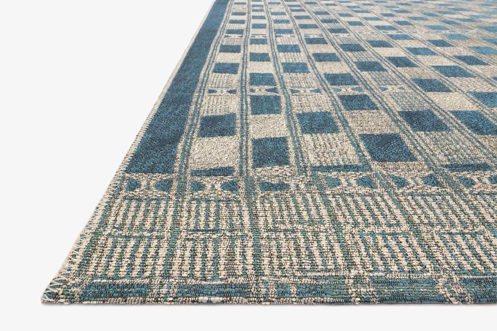 Rectangular indoor/outdoor rug in blue and ivory, textured check motif