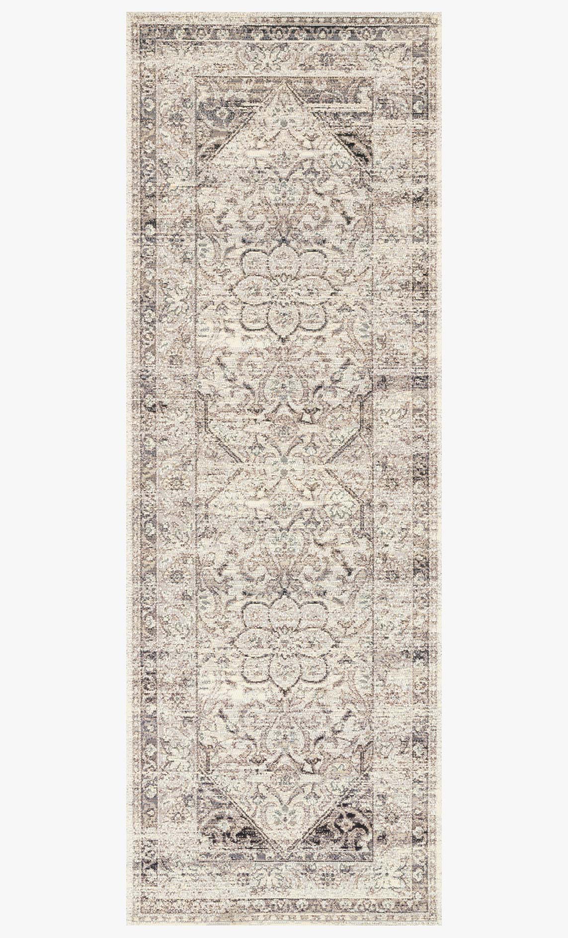 Stone-and-ivory indoor/outdoor rug with vertical scrollwork and ornate frame border.