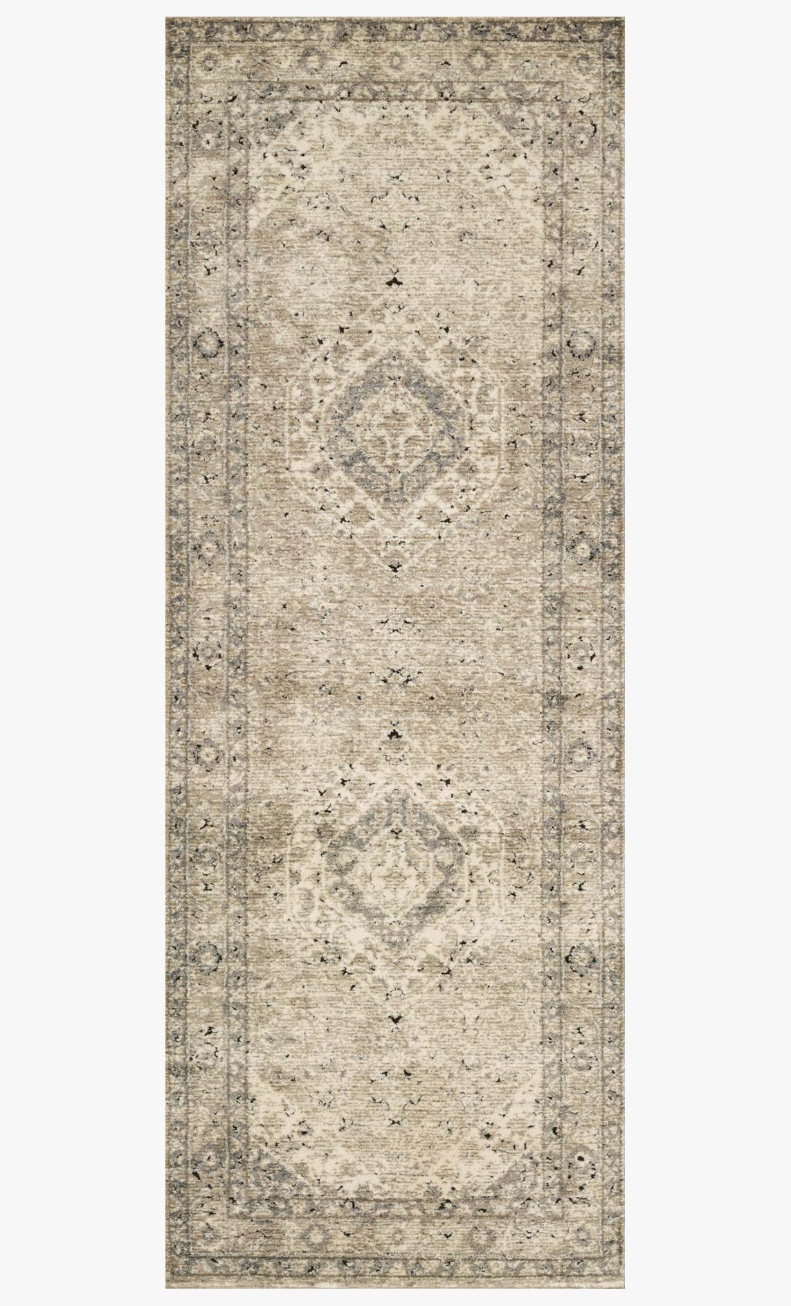 Sand and ivory rectangular rug with vertical medallion motif and ornate border