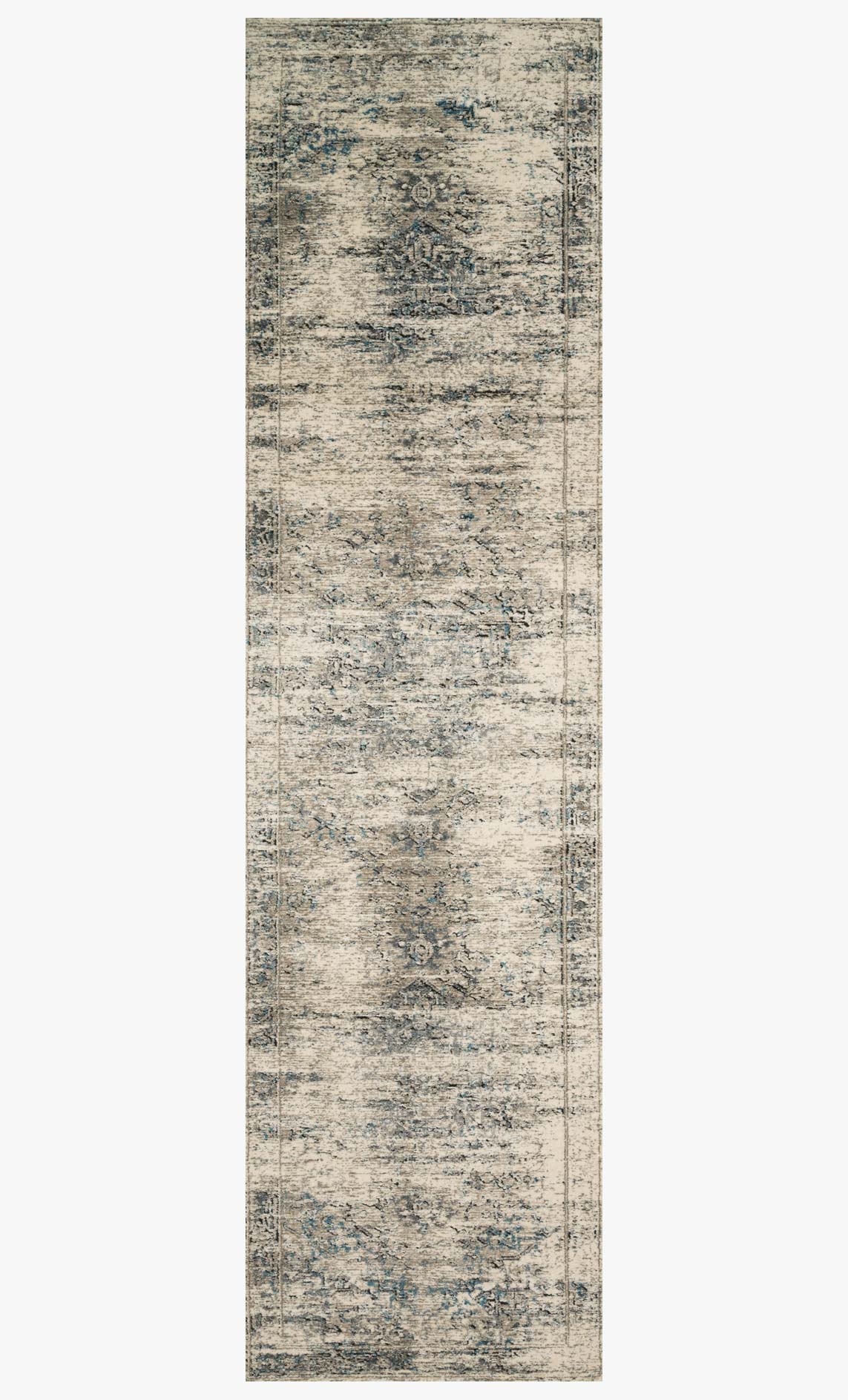 Narrow view of taupe and ivory power-loomed rug with blue faded pattern