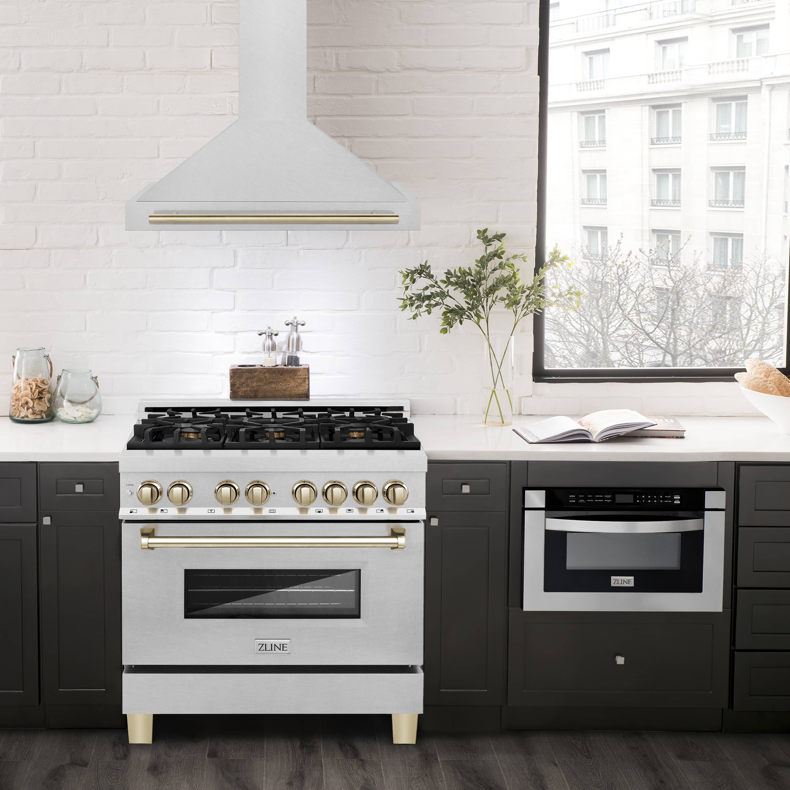 Wall-mounted range hood with gold-trimmed underside above a kitchen stove
