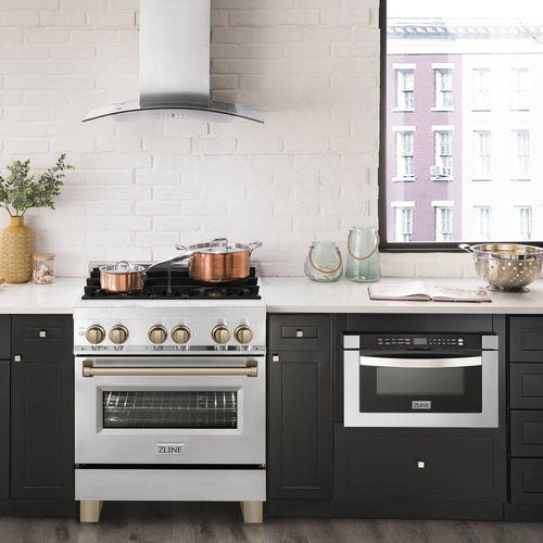Dual fuel range and wall hood in stainless with bronze trim accents