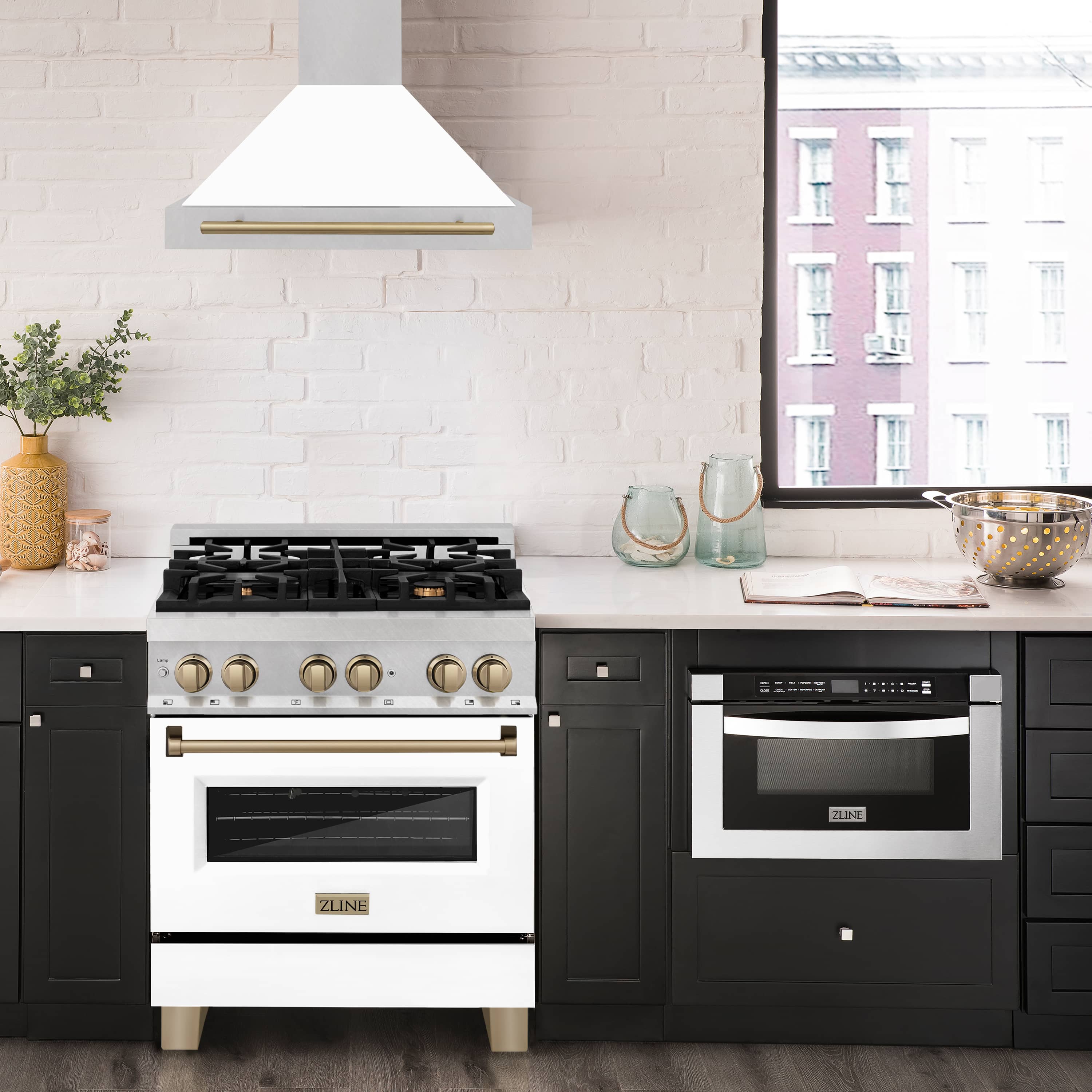 Wall range hood with white matte chimney, satin stainless sides, and bronze bar handle