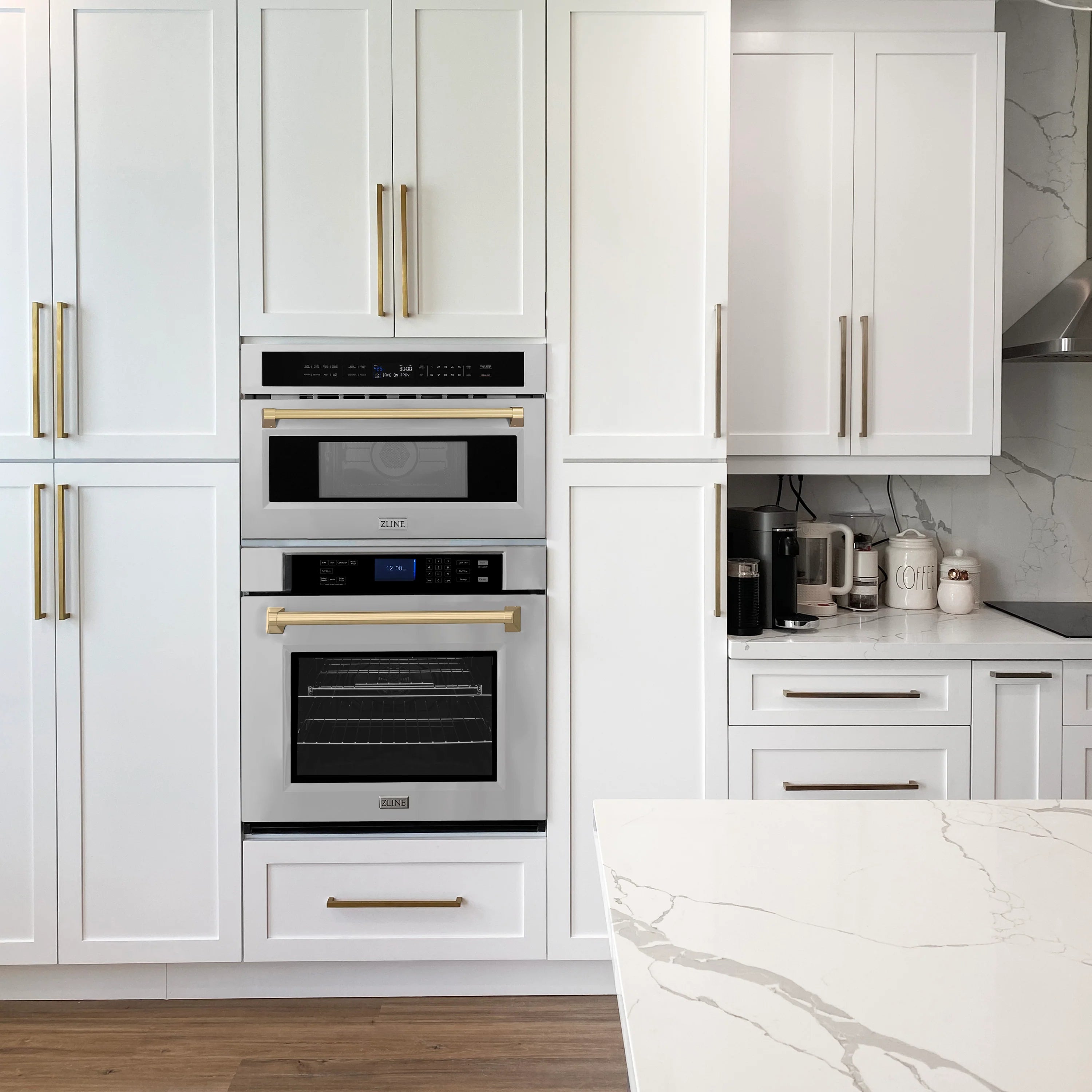 Built-in microwave oven centered in cabinetry with black window and champagne bronze accents