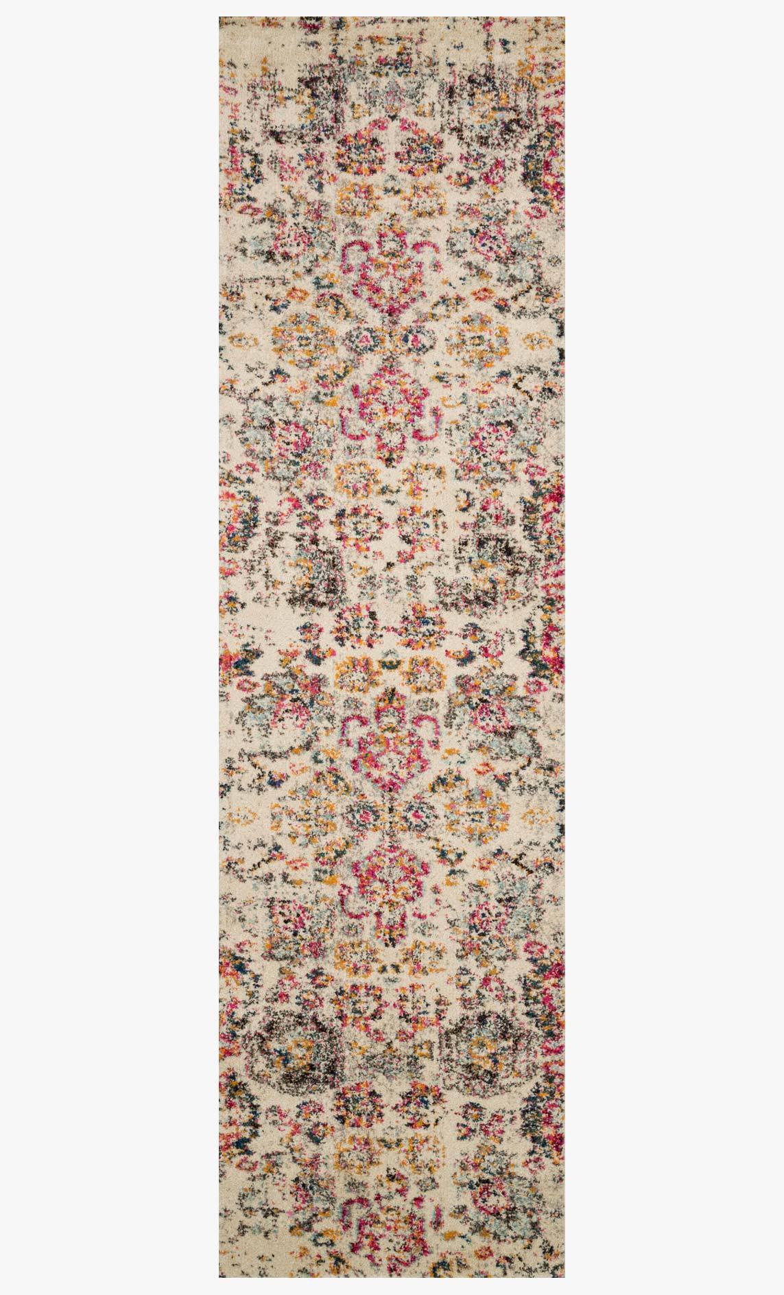 Rectangular ivory rug with dense multicolor ornamental pattern and distressed speckles