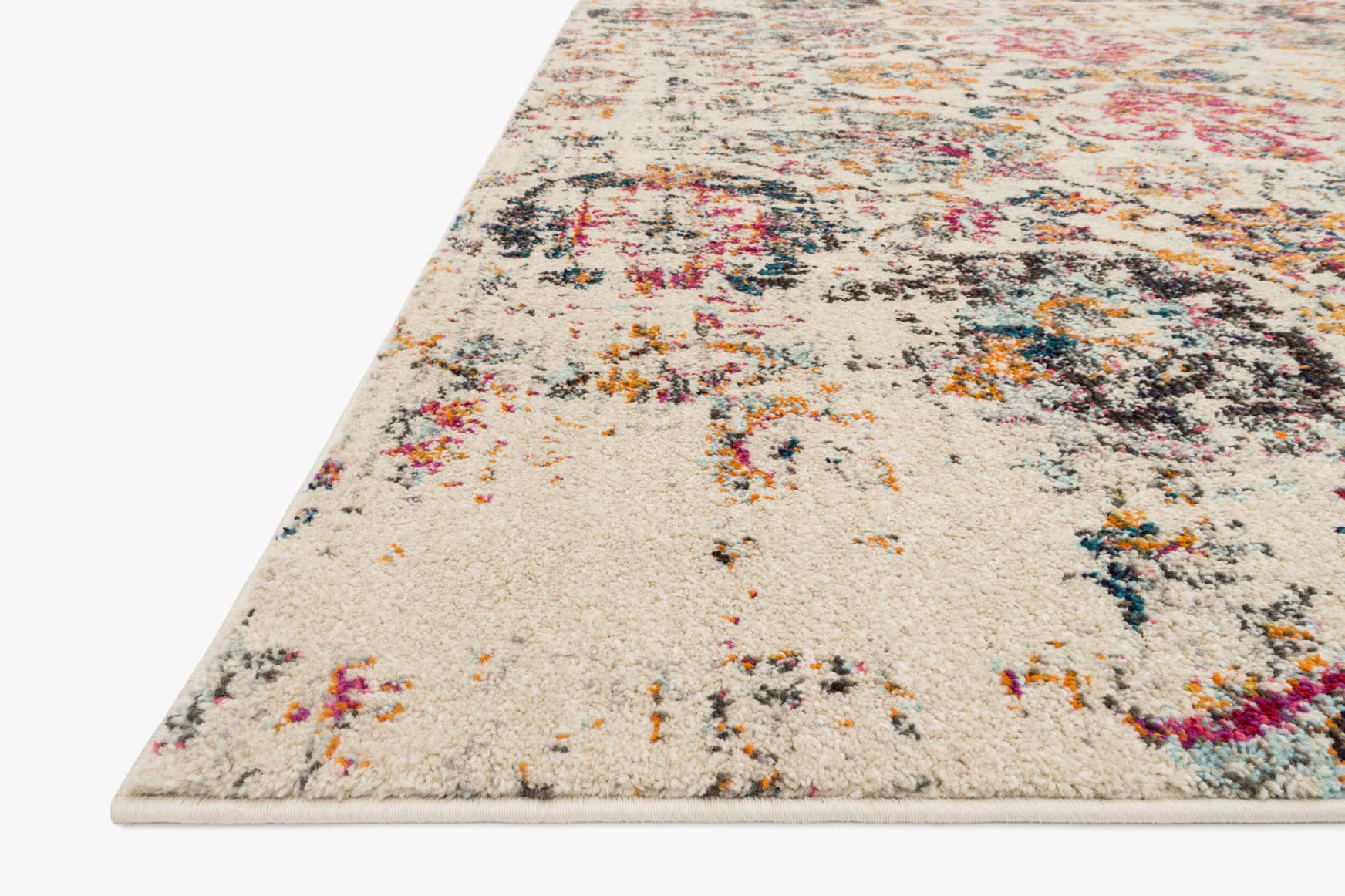 Ivory textured rug corner view with multicolor floral motifs and abstract distressed details