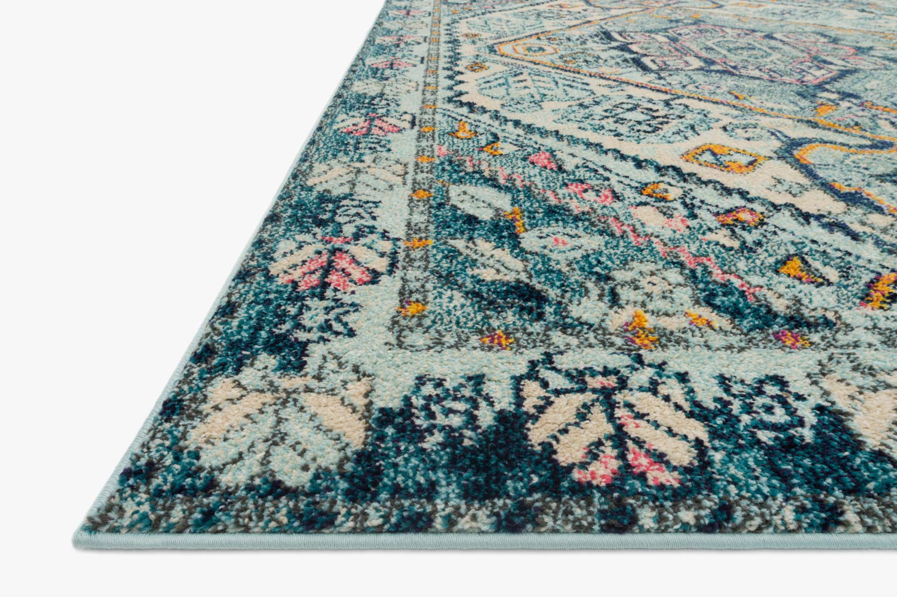 Transitional rug in aqua and navy with distressed medallion and ornamental border
