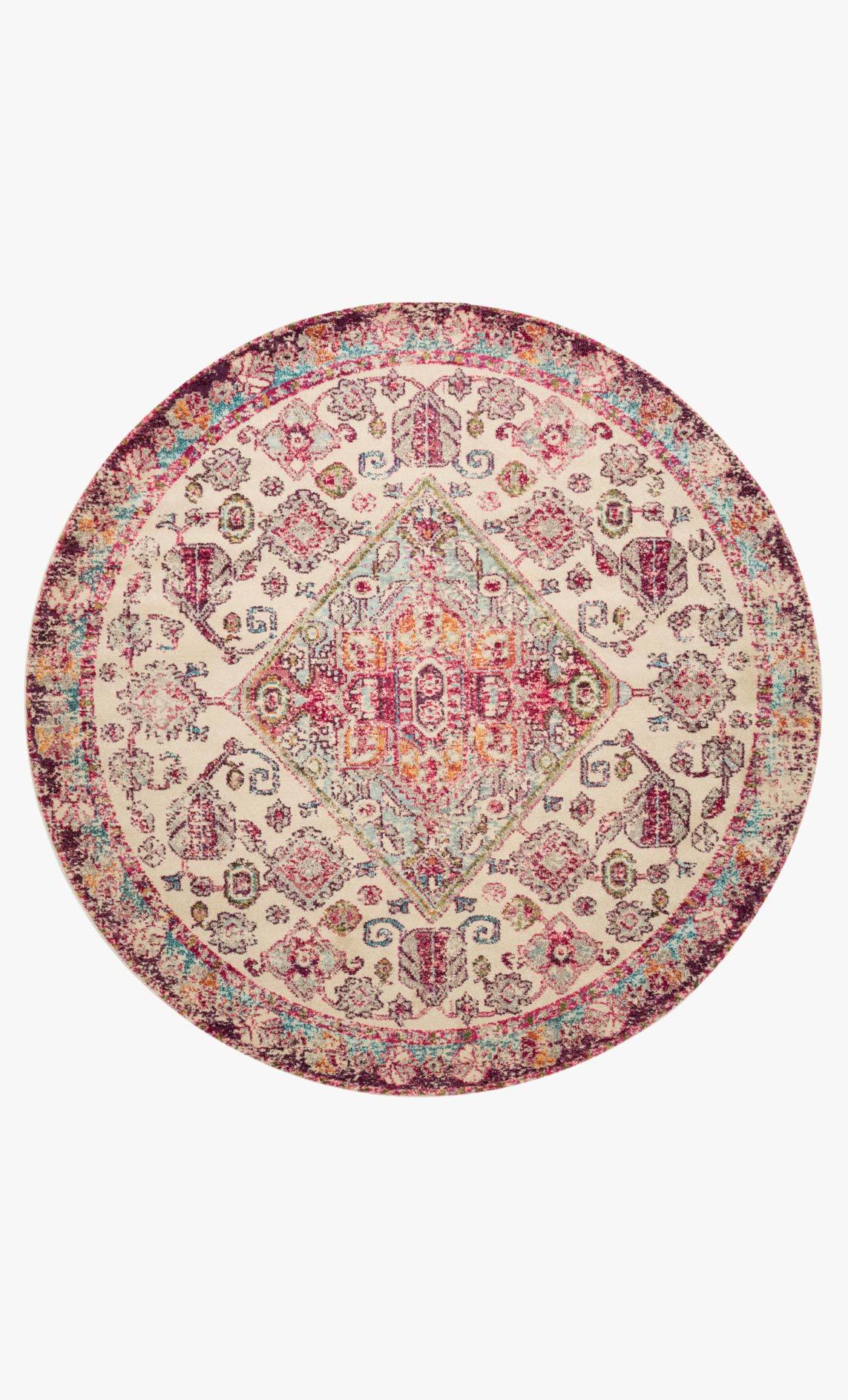 Round aqua and pink rug with a central medallion and intricate border motifs