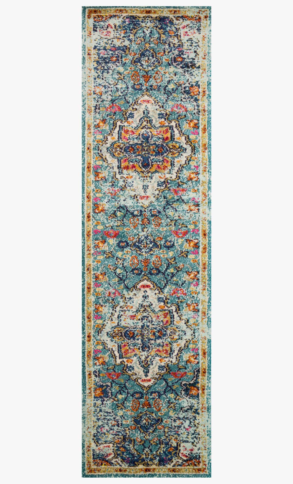 Tall blue and midnight power-loomed rug with repeating medallion and floral accents