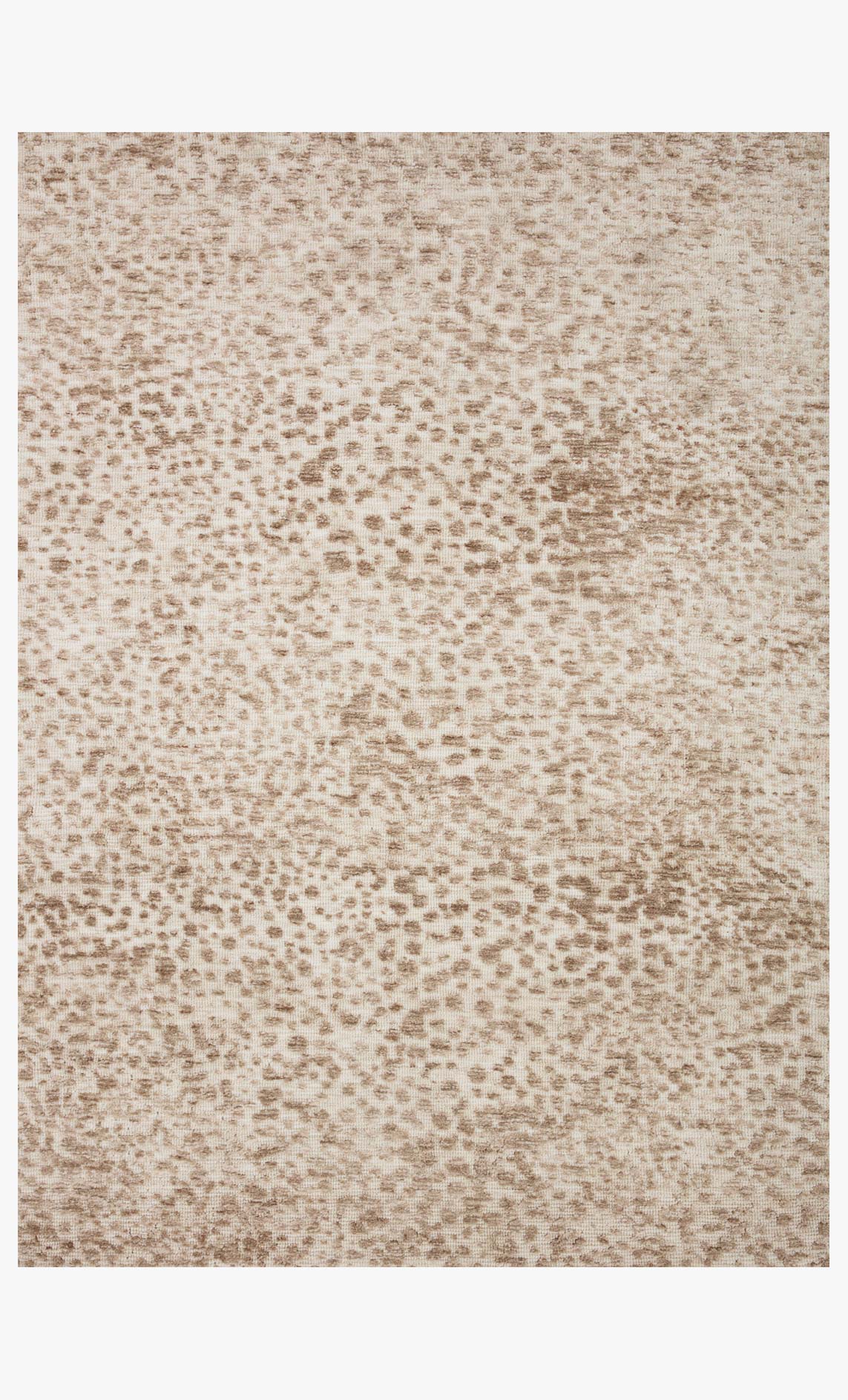 Ivory and sand power-loomed rug with mottled speckled texture, rectangular design
