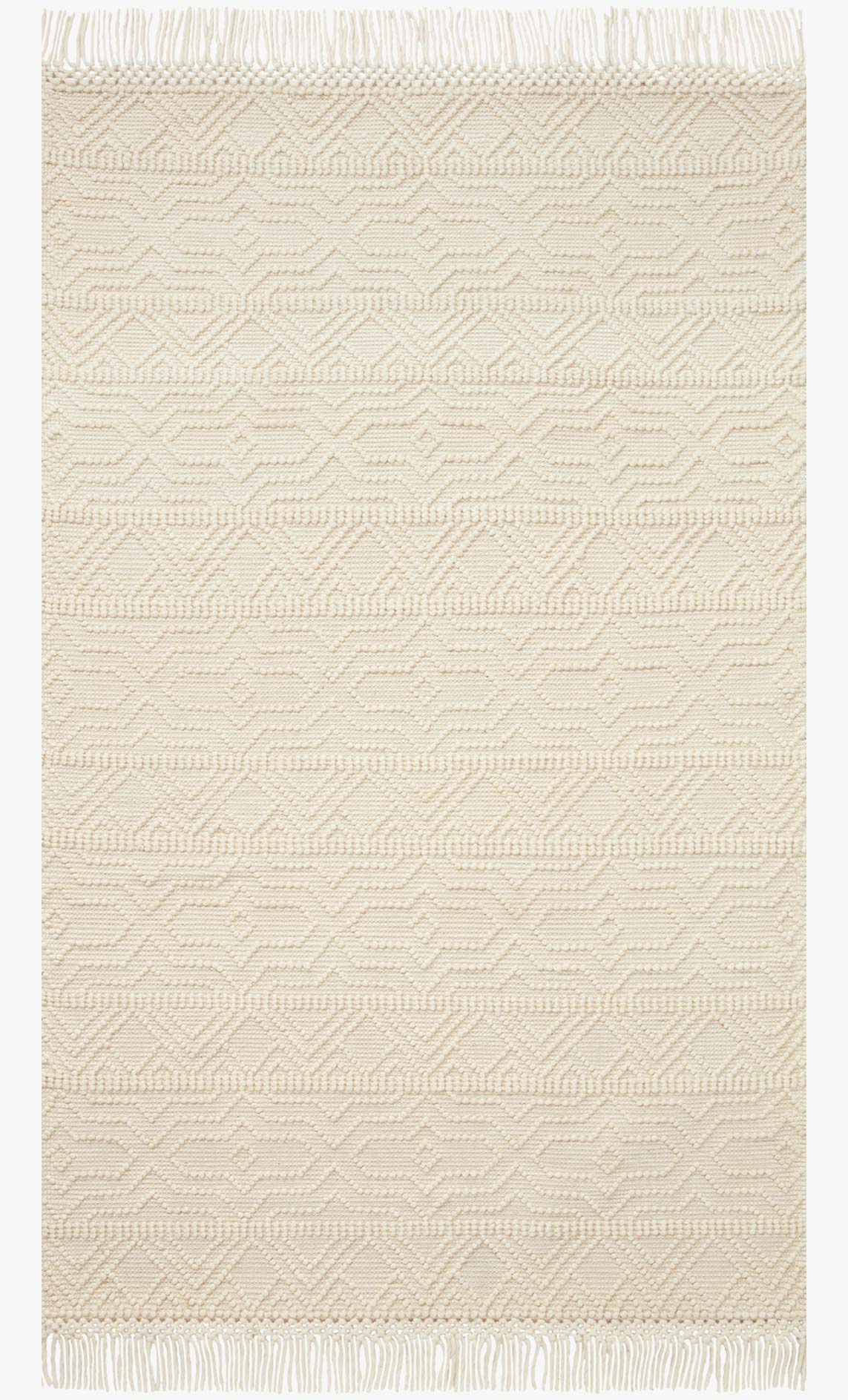 Ivory hand-woven area rug with geometric chevron pattern and fringe edges