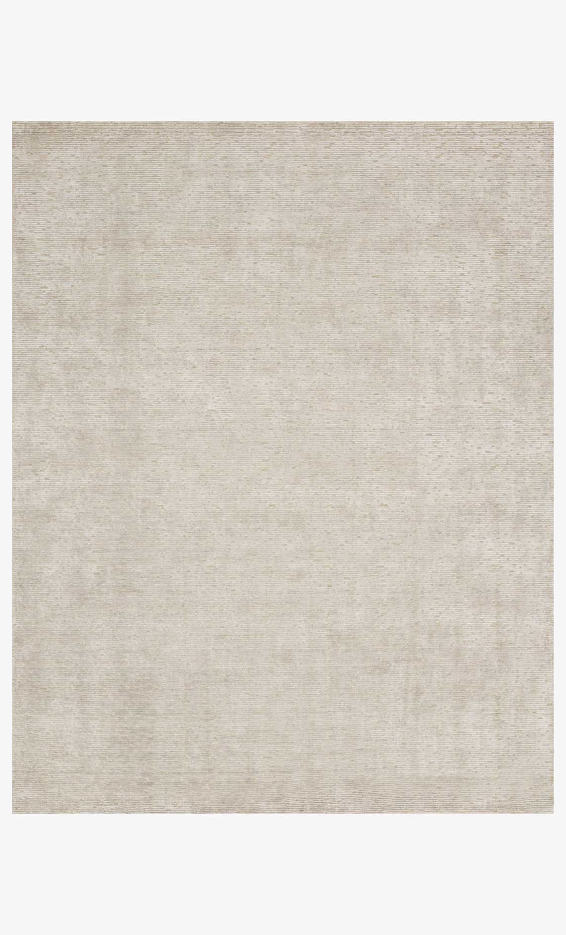 Beige hand-loomed rug with subtle solid texture and flat weave border