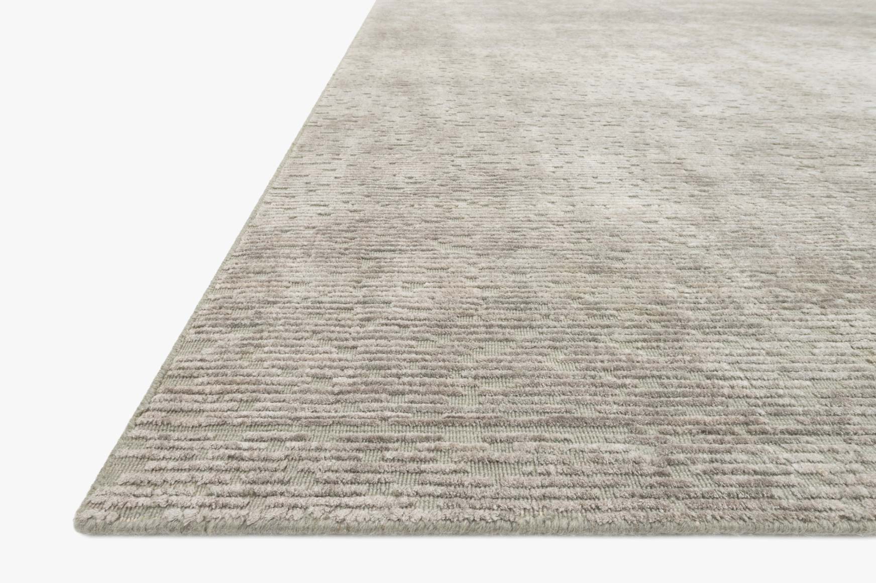 Hand-loomed area rug in silver-gray with low, tightly woven texture