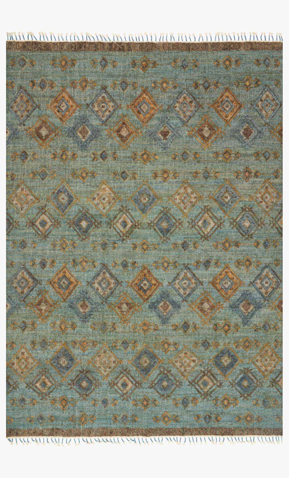 Hand-woven area rug with sea-green and blue diamond pattern, fringed edges