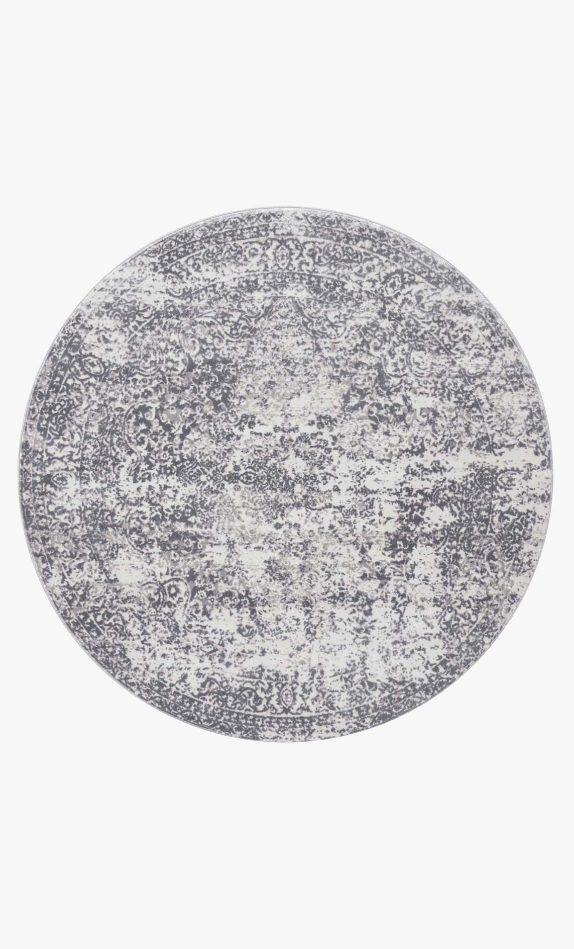 Round silver and light-gray rug with abstract distressed speckle pattern