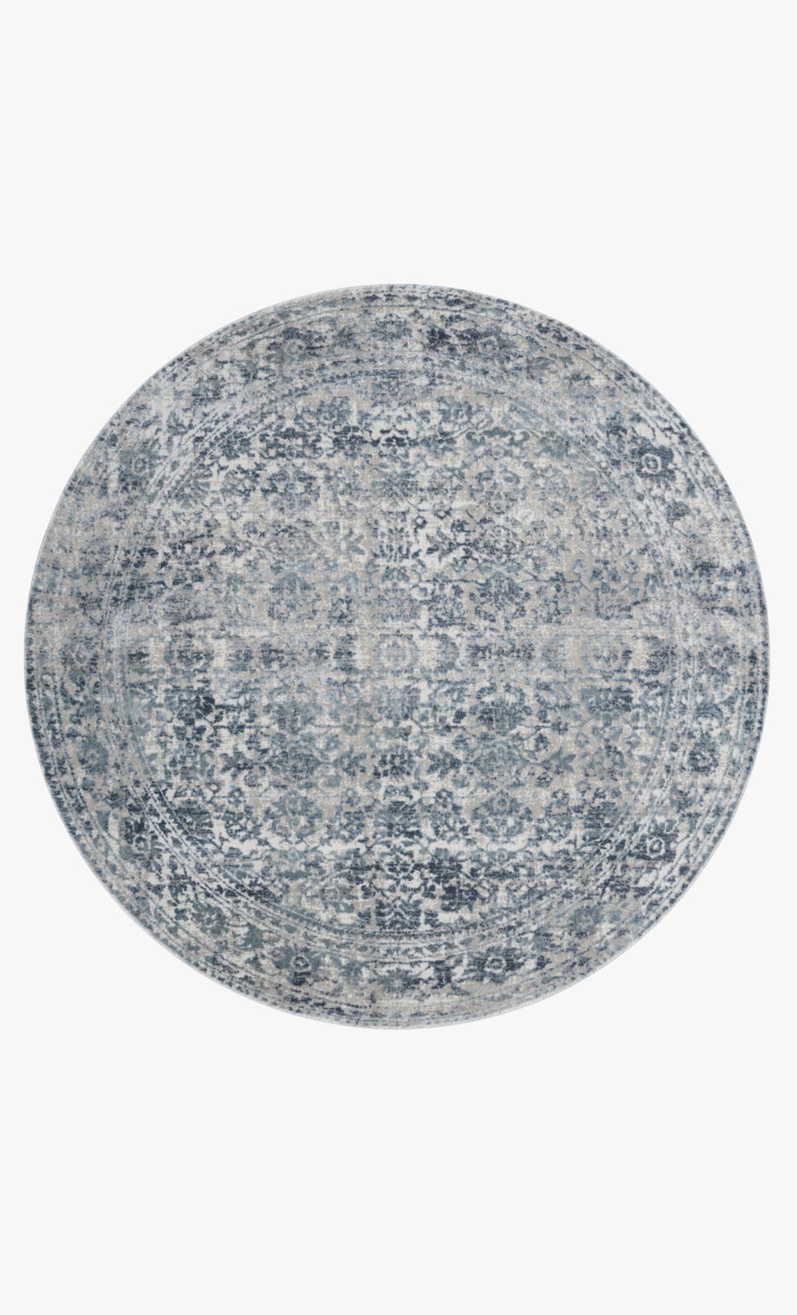 Round transitional power-loomed rug in sky blue and stone with distressed ornate patchwork
