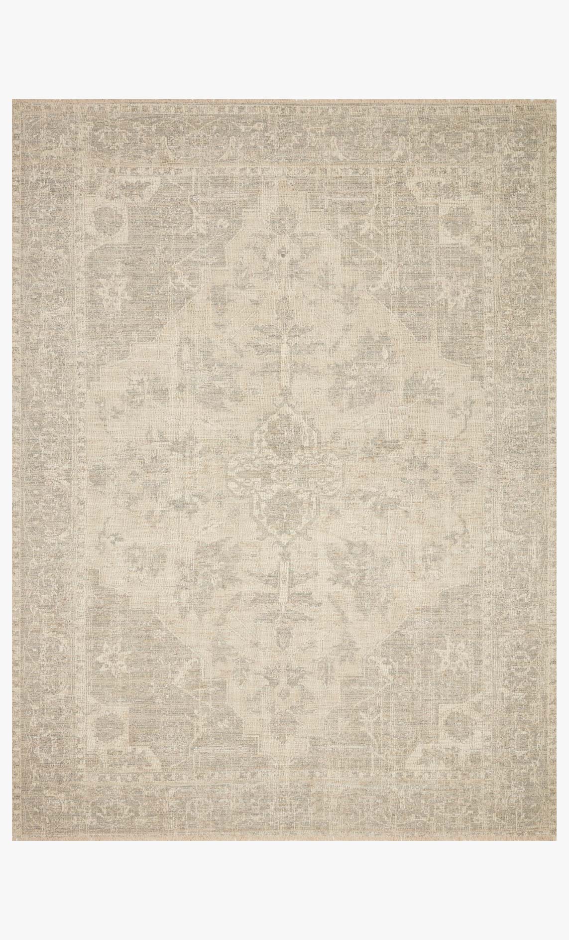 Hand-woven transitional rug with light ivory and subtle grey abstract pattern