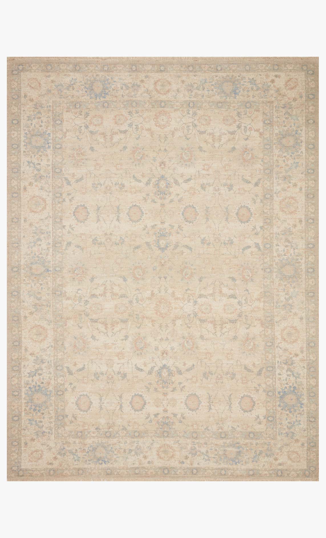 Hand-woven area rug with natural base and muted blue pattern, bordered edges.