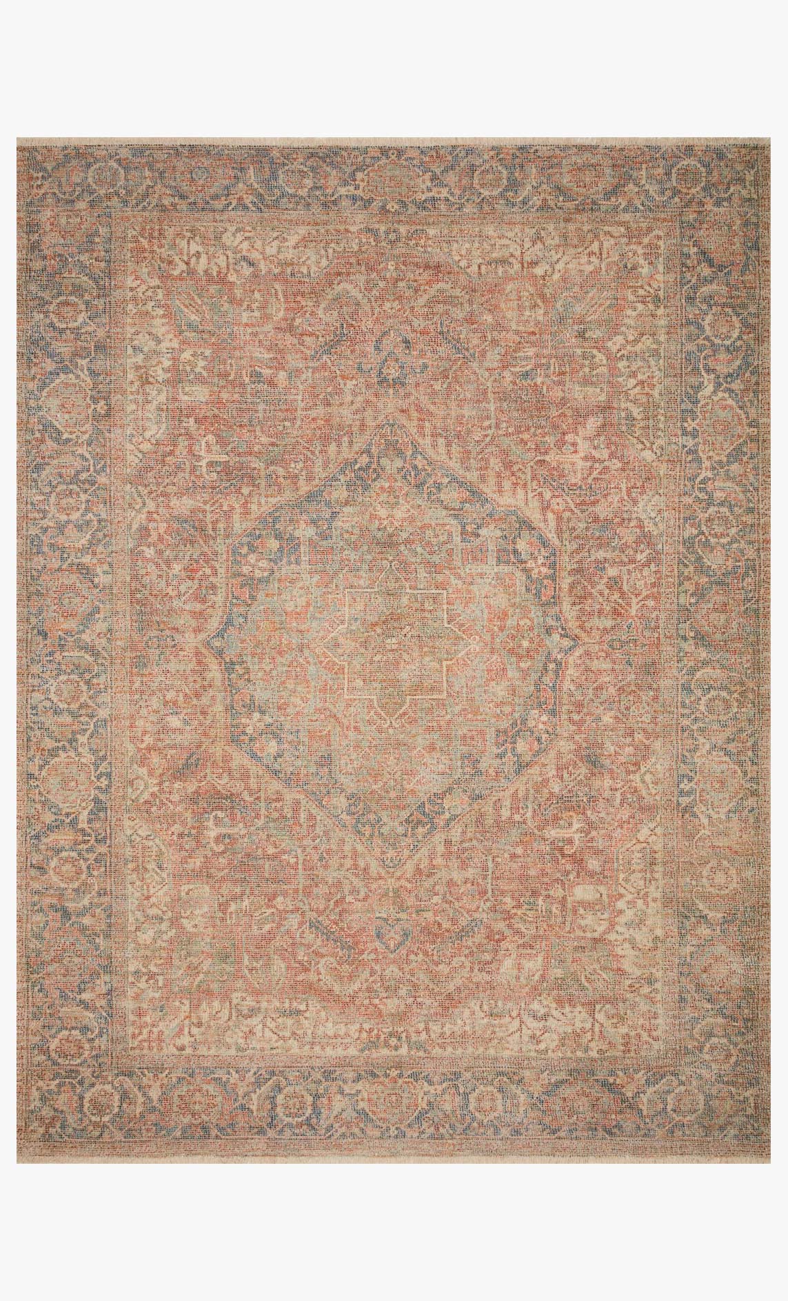 Hand-woven area rug with brick and navy abstract medallion pattern and border