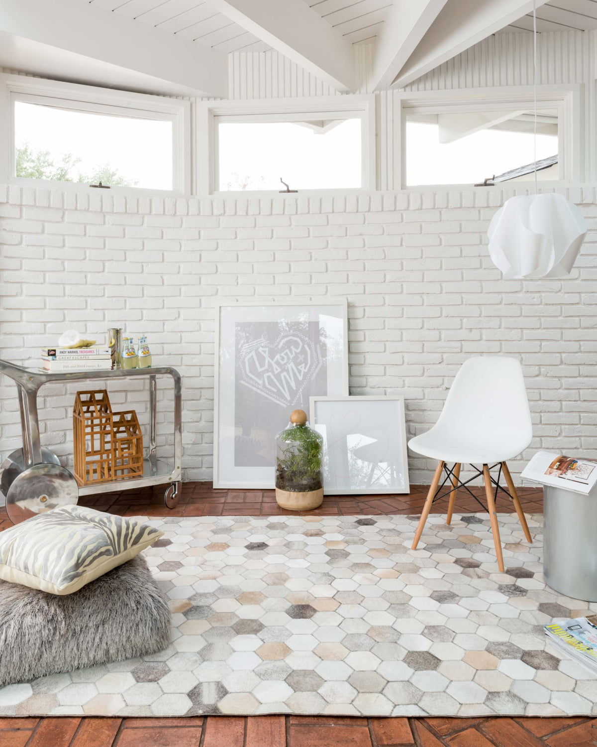 Grey hexagon pattern rug with hand-stitched look and alternating light and dark blocks