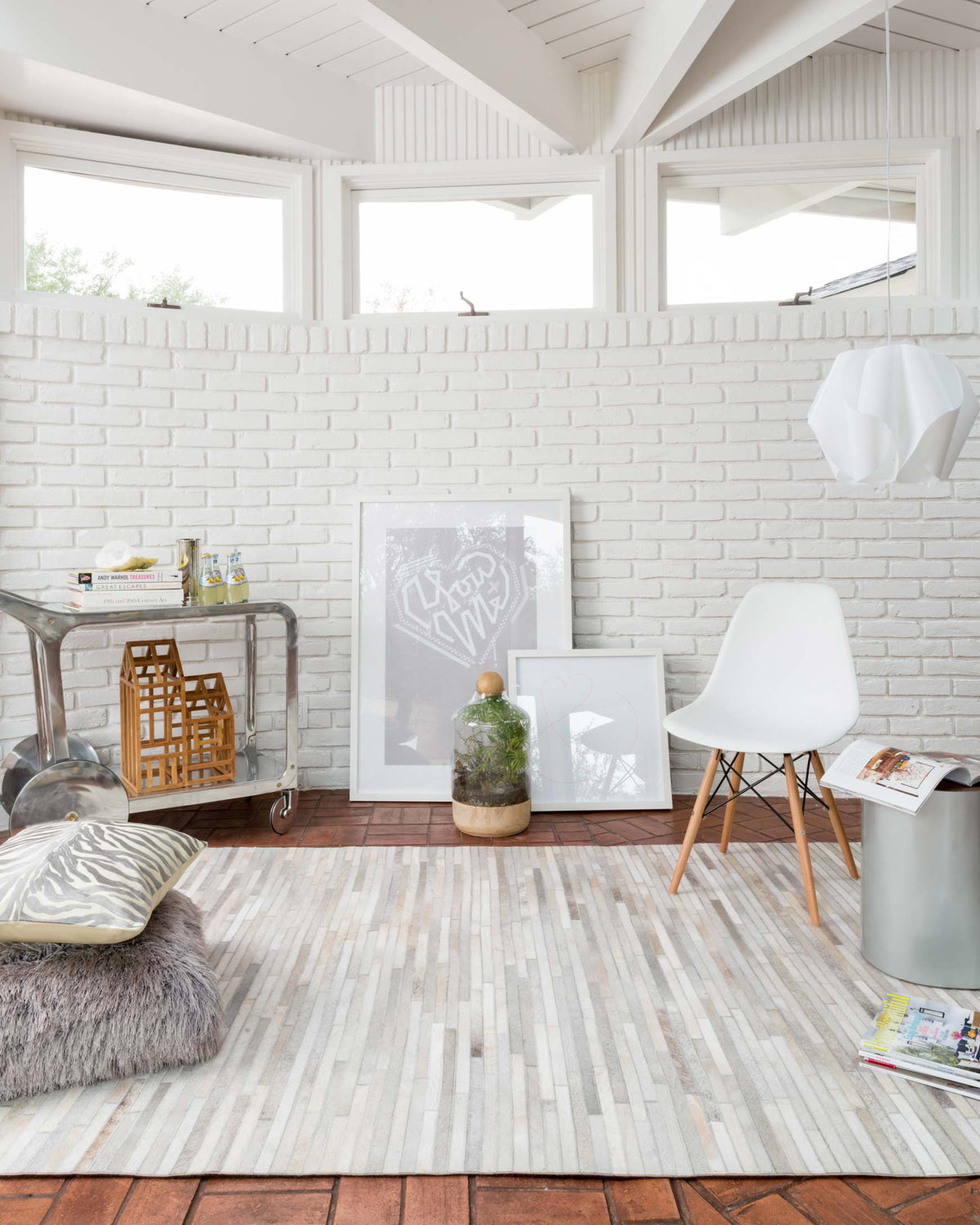 Ivory area rug with scattered linear stripes and subtle distressed texture, full view