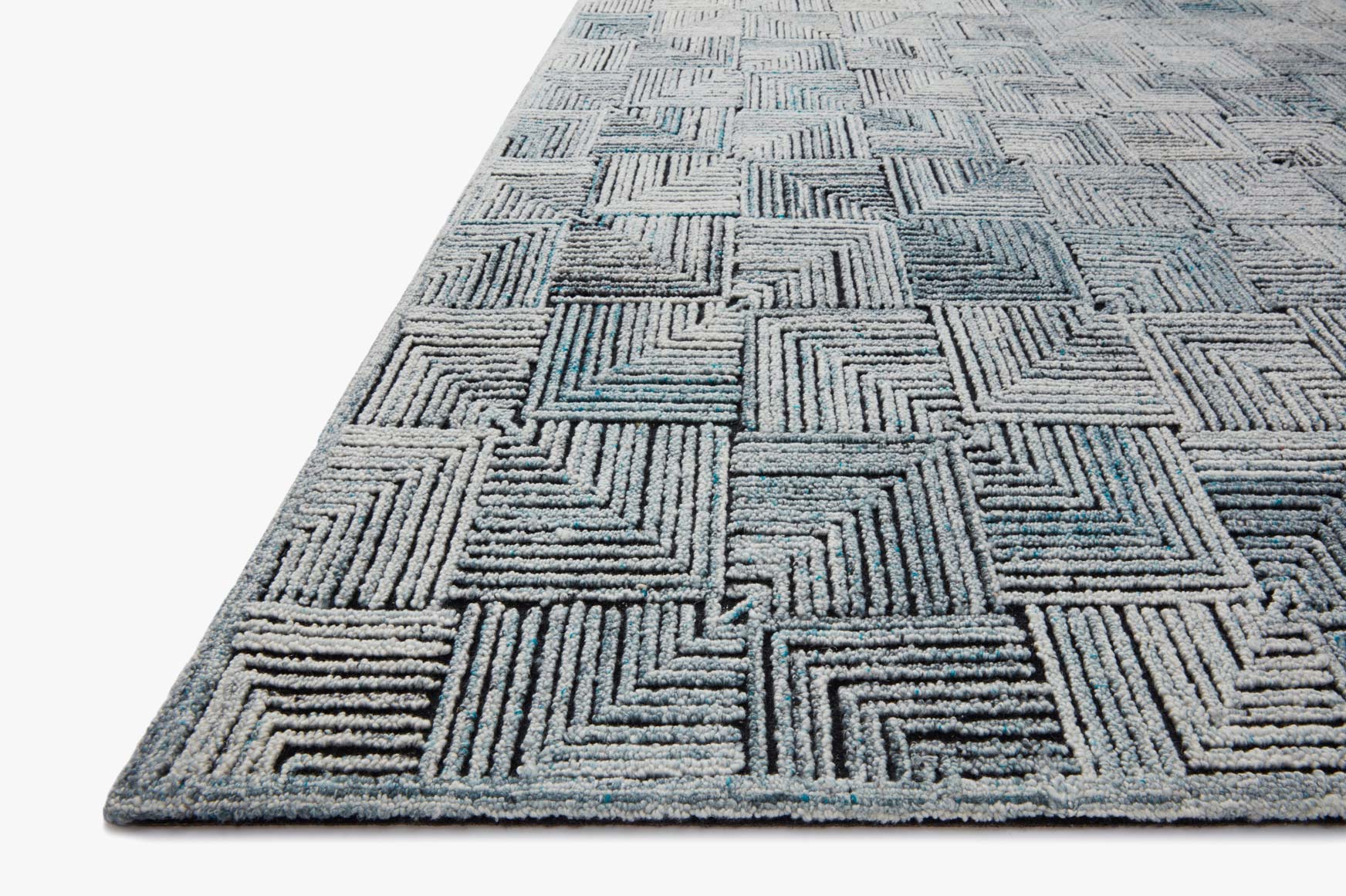 Loloi contemporary hooked rug, arctic blue and ivory geometric blocks in angled view