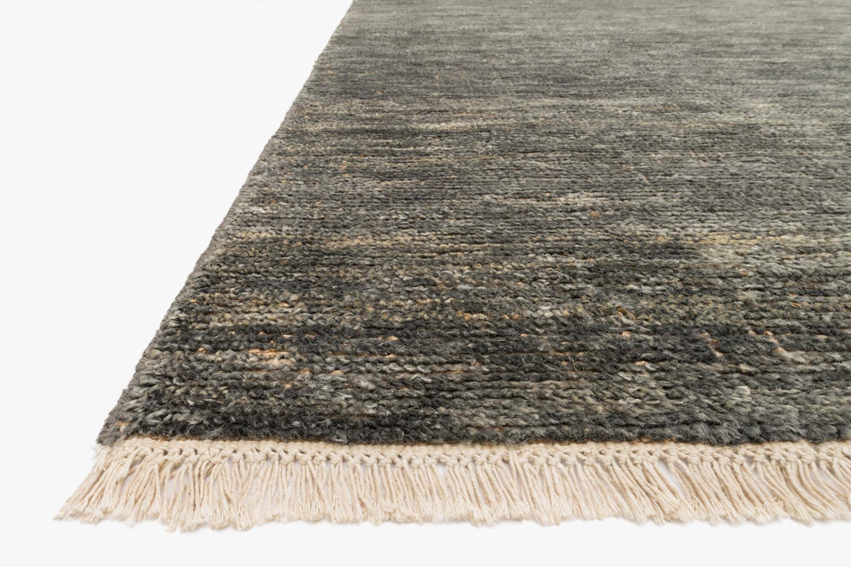 Grey contemporary hand-knotted rug corner with short fringe and textured weave