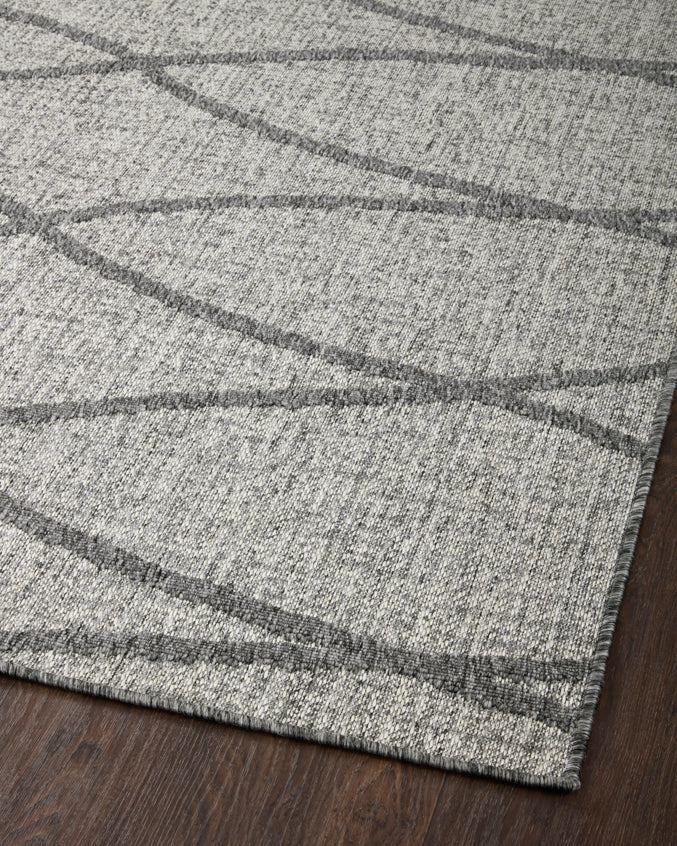 Light grey rug with dark grey horizontal and diagonal grid pattern