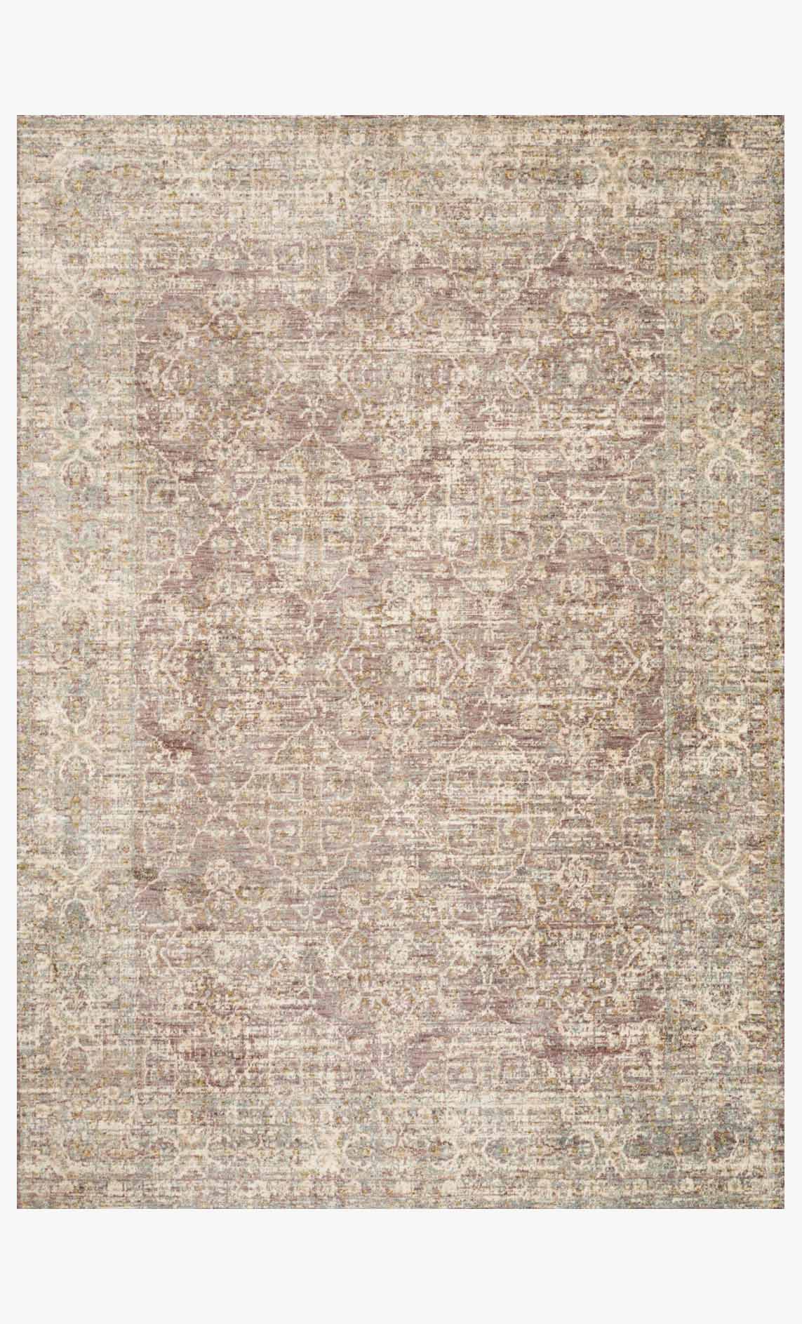 Traditional power-loomed rug with abstract distressed pattern, lilac and beige tones.