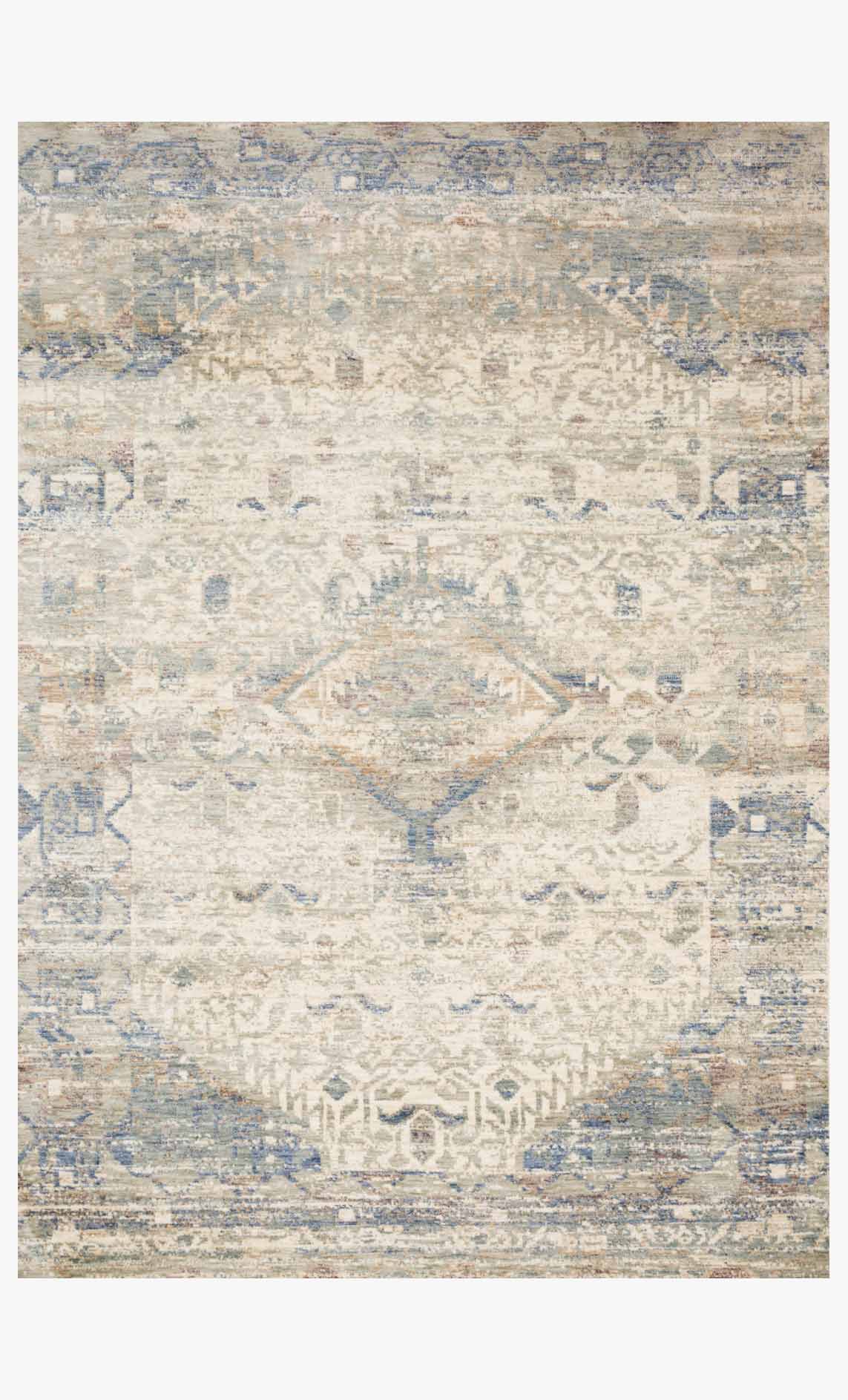 Ivory and blue traditional power-loomed rug with geometric medallion pattern