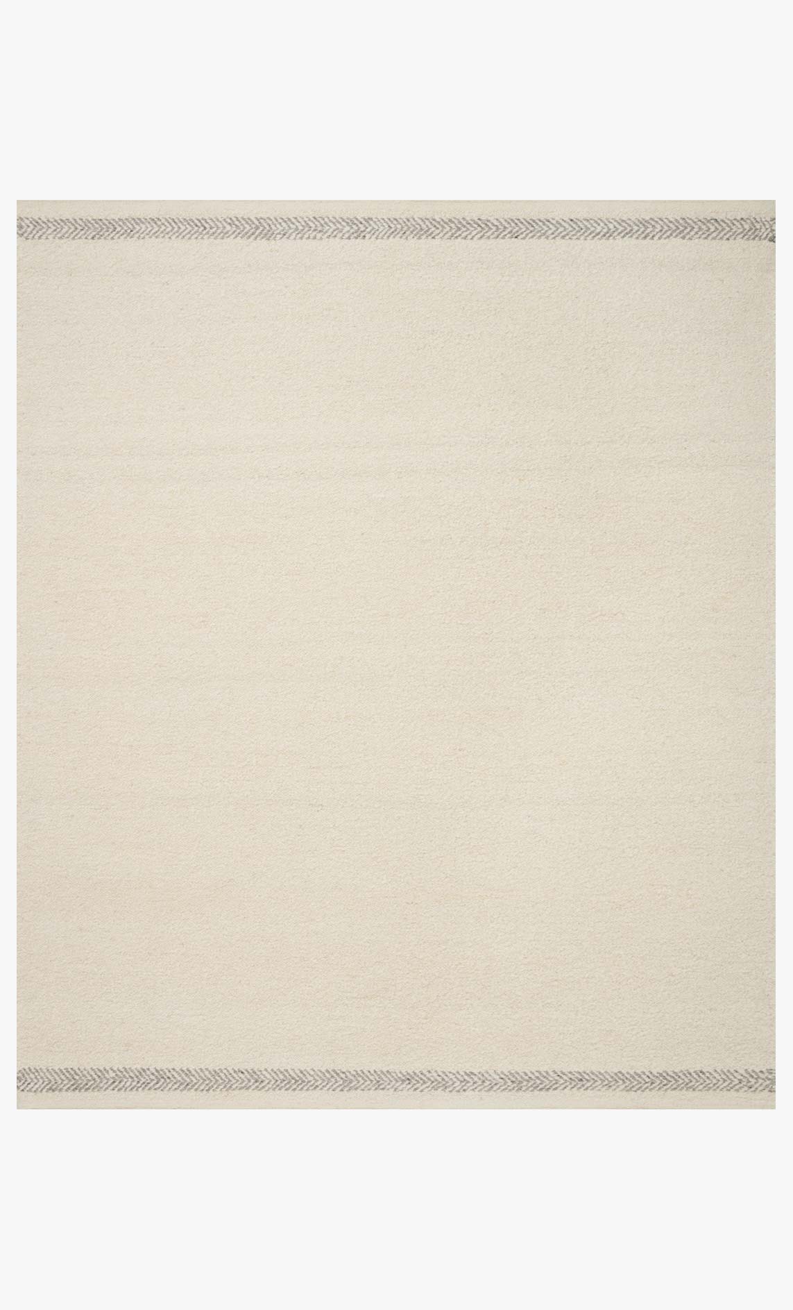 Ivory hand-woven rug with thin silver border and textured weave