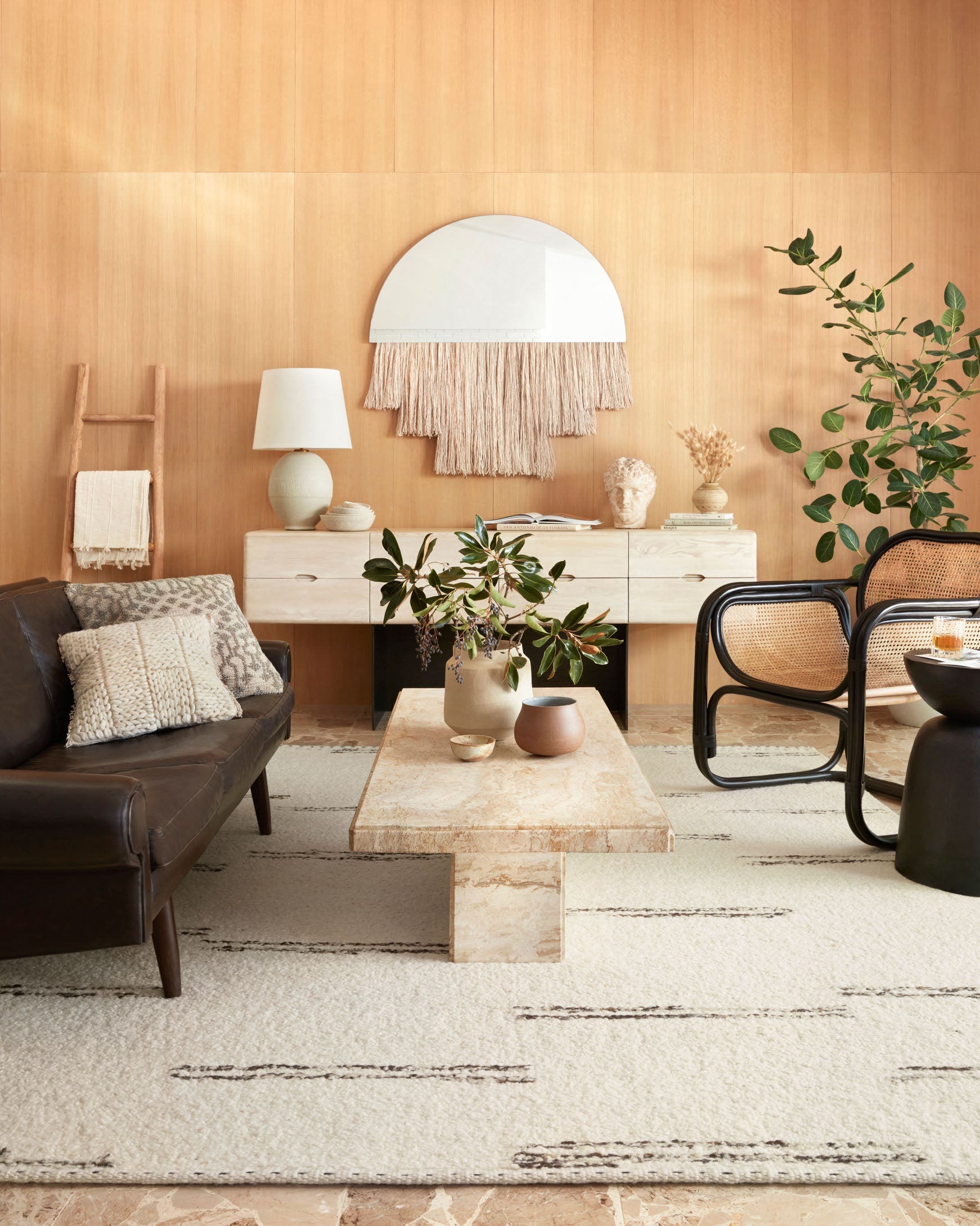 Ivory hand-woven rug with minimalist gray-brown linear pattern and textured pile
