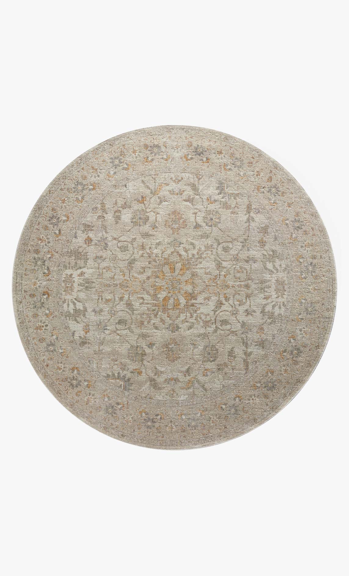 Round ivory and natural rug with distressed ornate medallion-style pattern