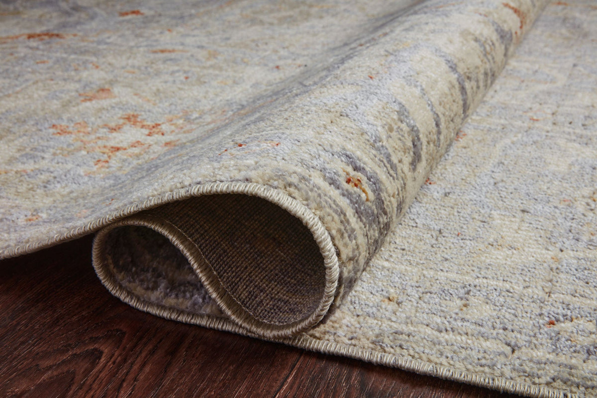 Traditional power-loomed rug rolled edge, oatmeal with lavender tones and short fringed border