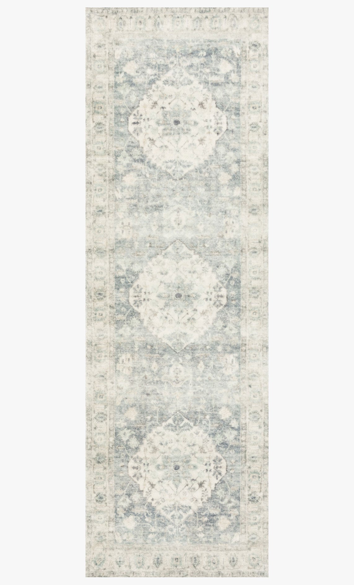 Traditional power-loomed rug in denim and fog with three stacked floral medallions