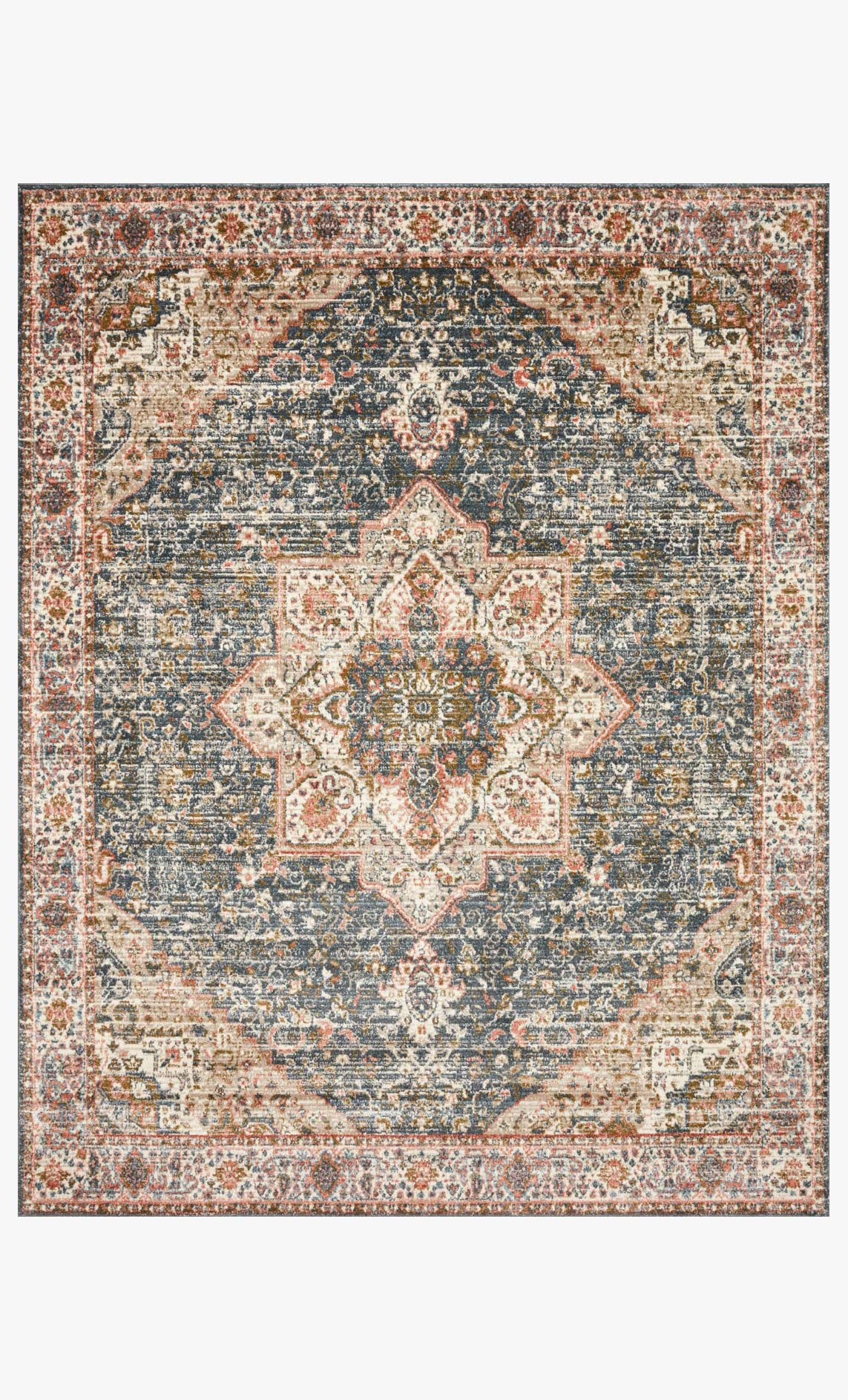 Traditional power-loomed rug with ornate medallion pattern in blue and rust tones