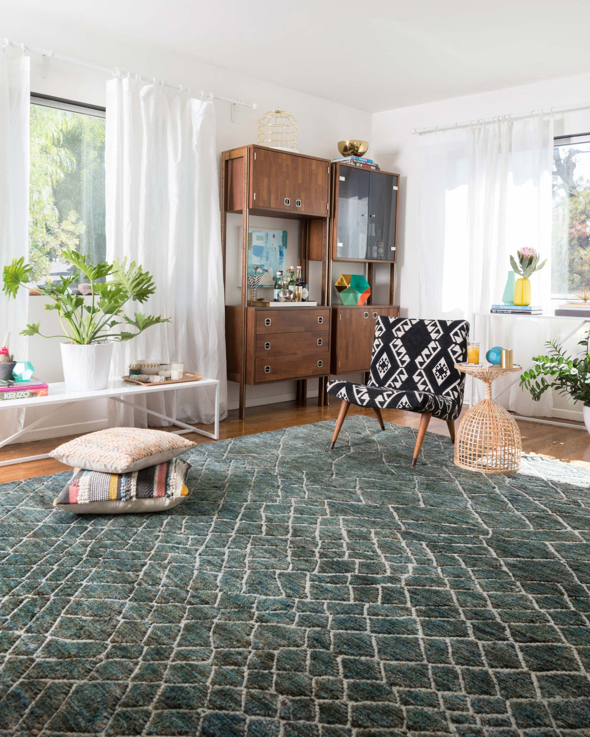 Textured teal area rug with white lattice diamond pattern, rectangular shape