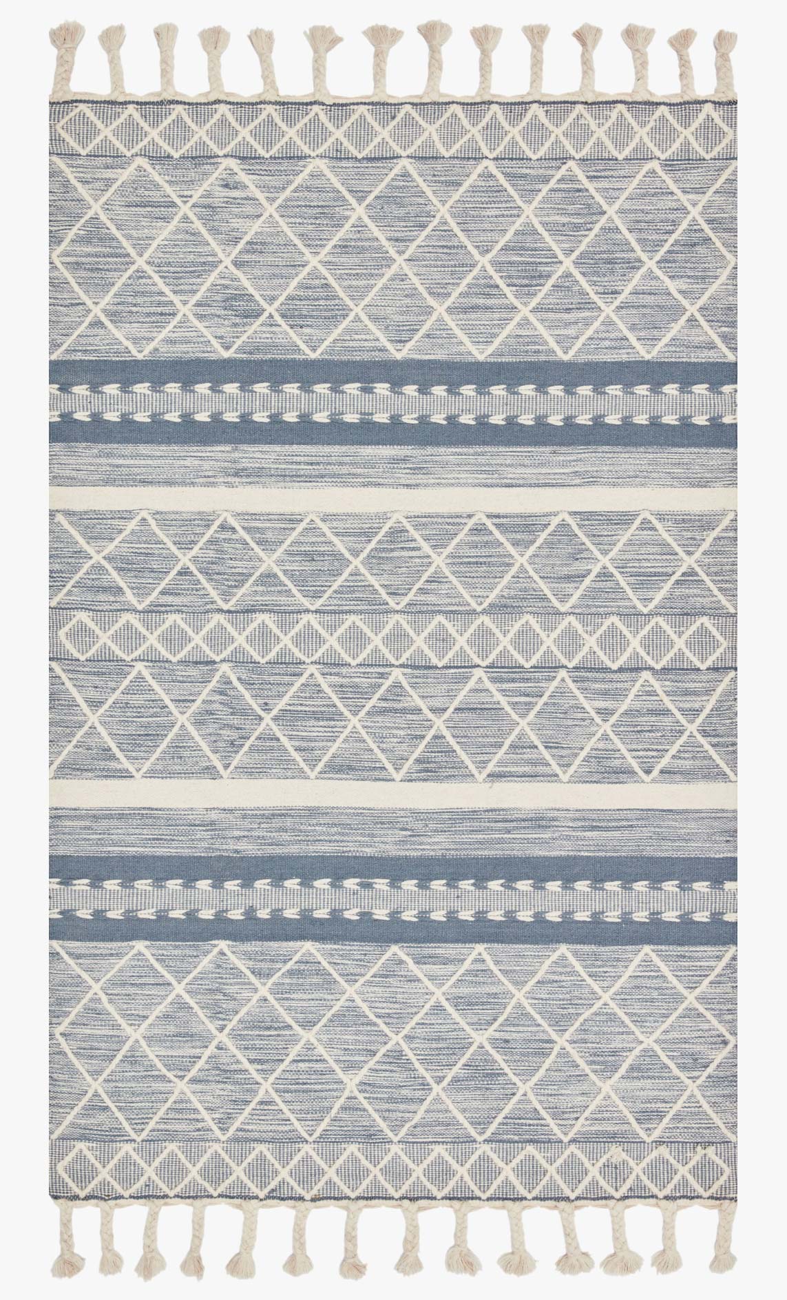 Teal hand-loomed rug with white diamond pattern and fringe border