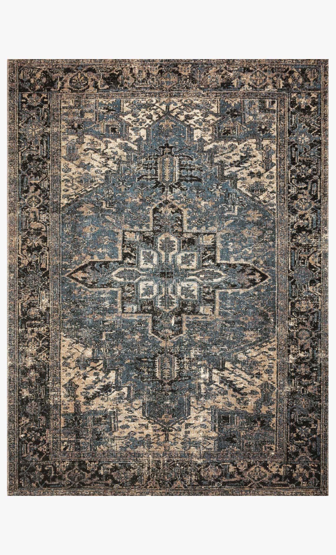 Traditional power-loomed area rug in blue and dark navy with ornate central medallion and border