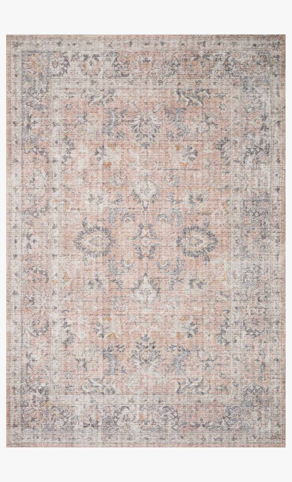 Blush and grey traditional rug with distressed ornate pattern, flat woven surface.