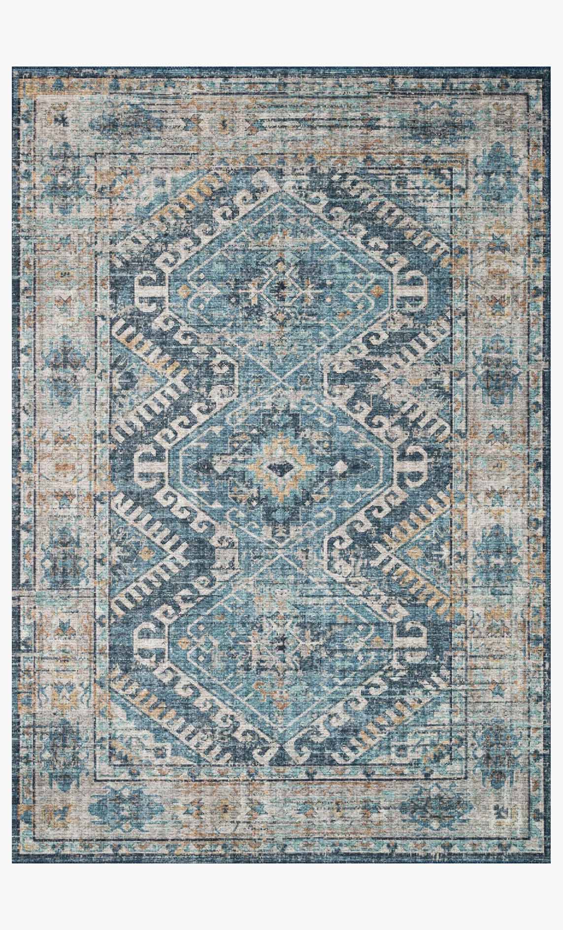 Traditional power-loomed area rug with denim-blue and natural medallion pattern, bordered
