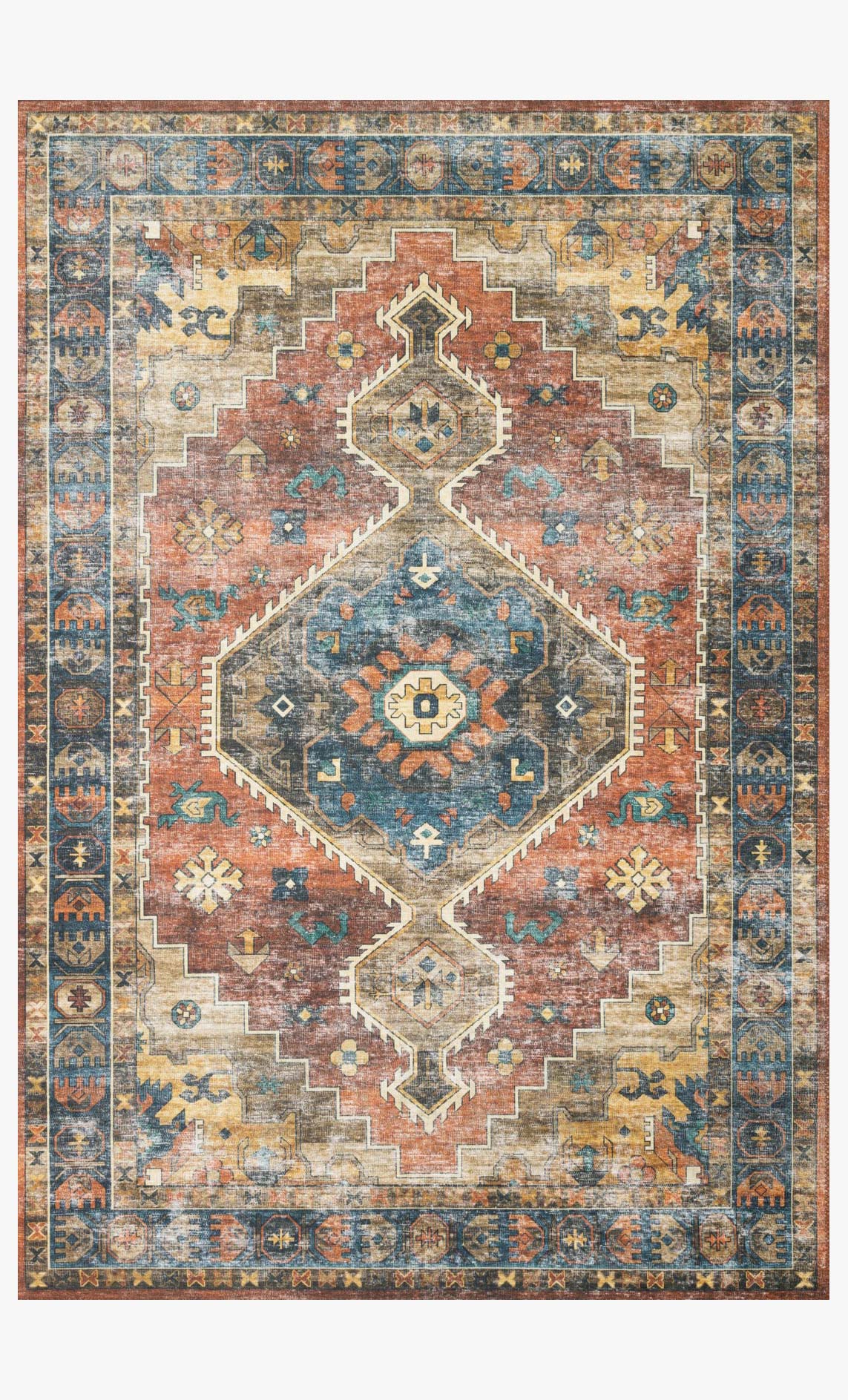 Rust and blue traditional power-loomed rug with ornate geometric medallion pattern