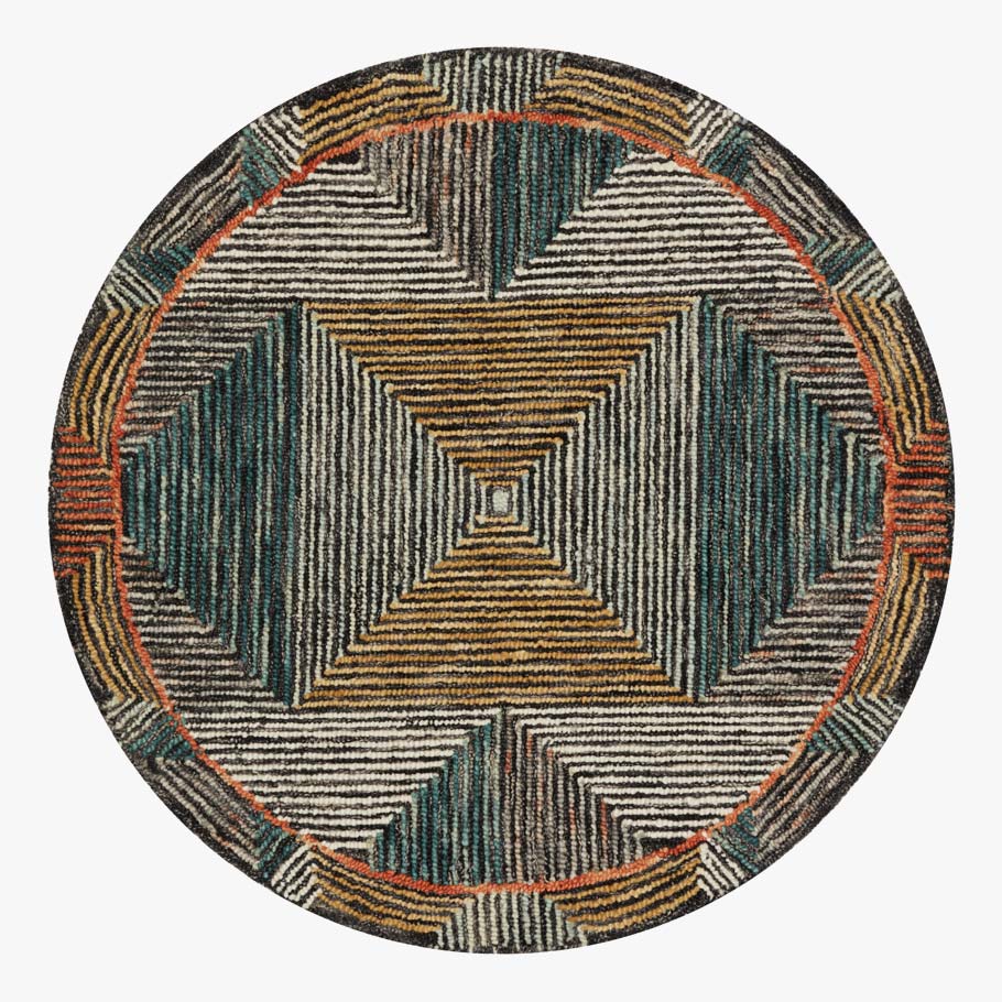 Round hooked rug with centered diamond motif and teal, tan, and orange zigzag border.