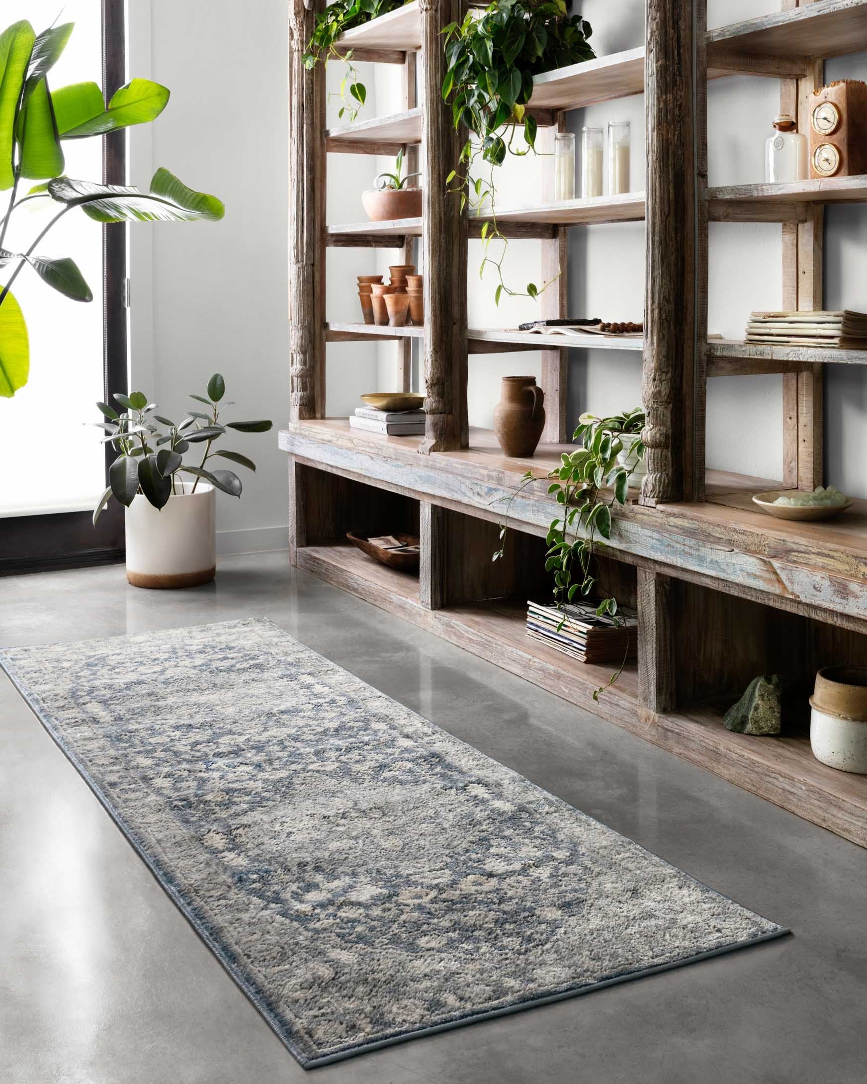 Loloi II Teagan Collection power loomed rug in denim and mist with wide border and distressed motifs