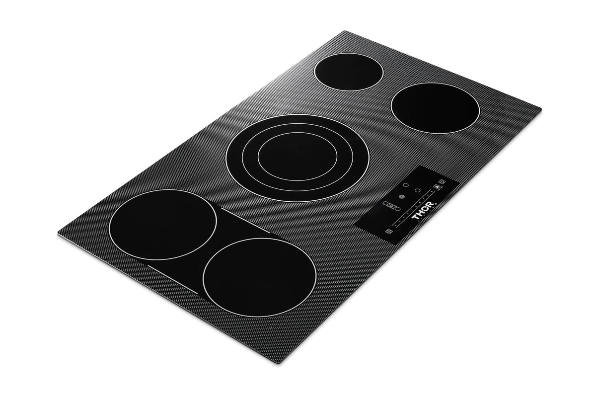 Black glass electric cooktop with round burner zones and integrated touch controls