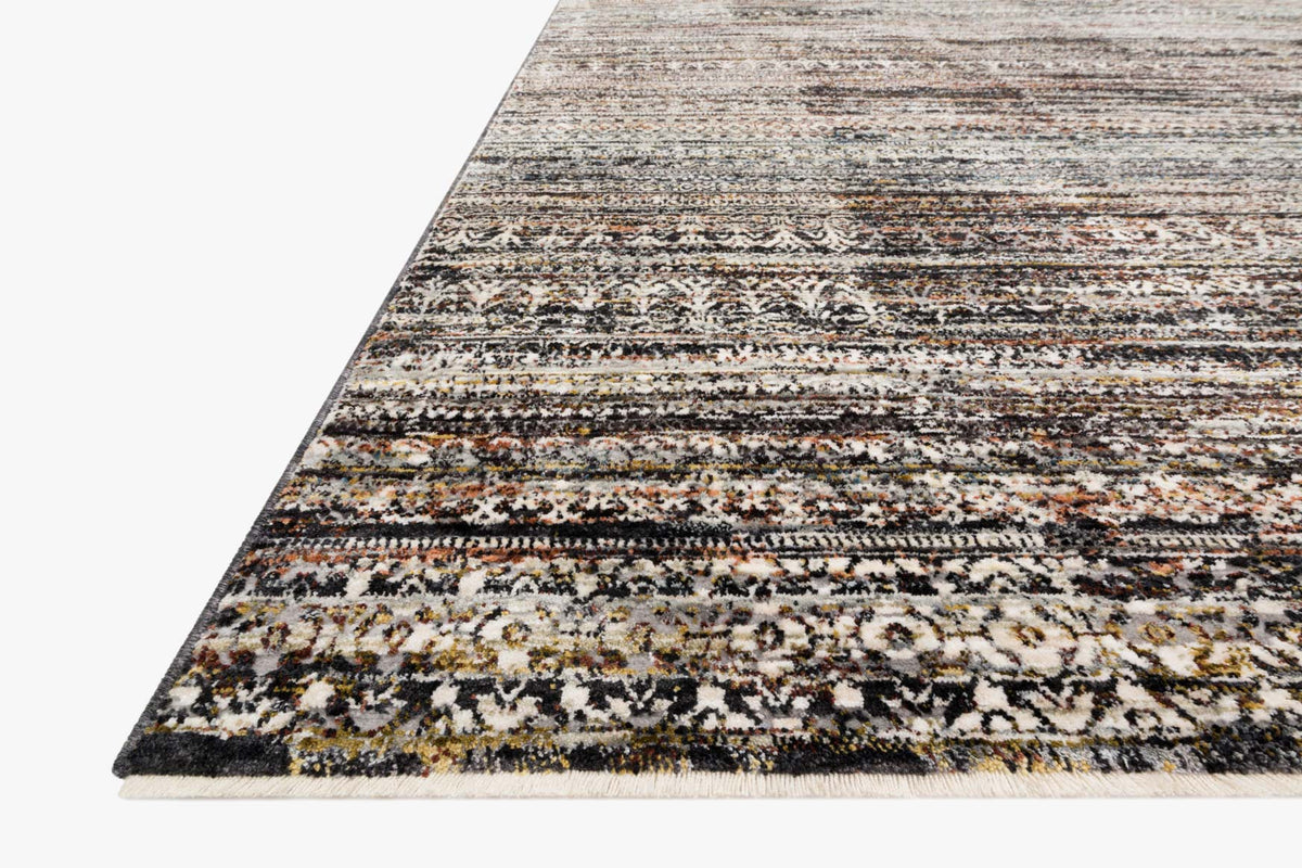 Grey power-loomed rug corner detail with multicolor horizontal stripe motif