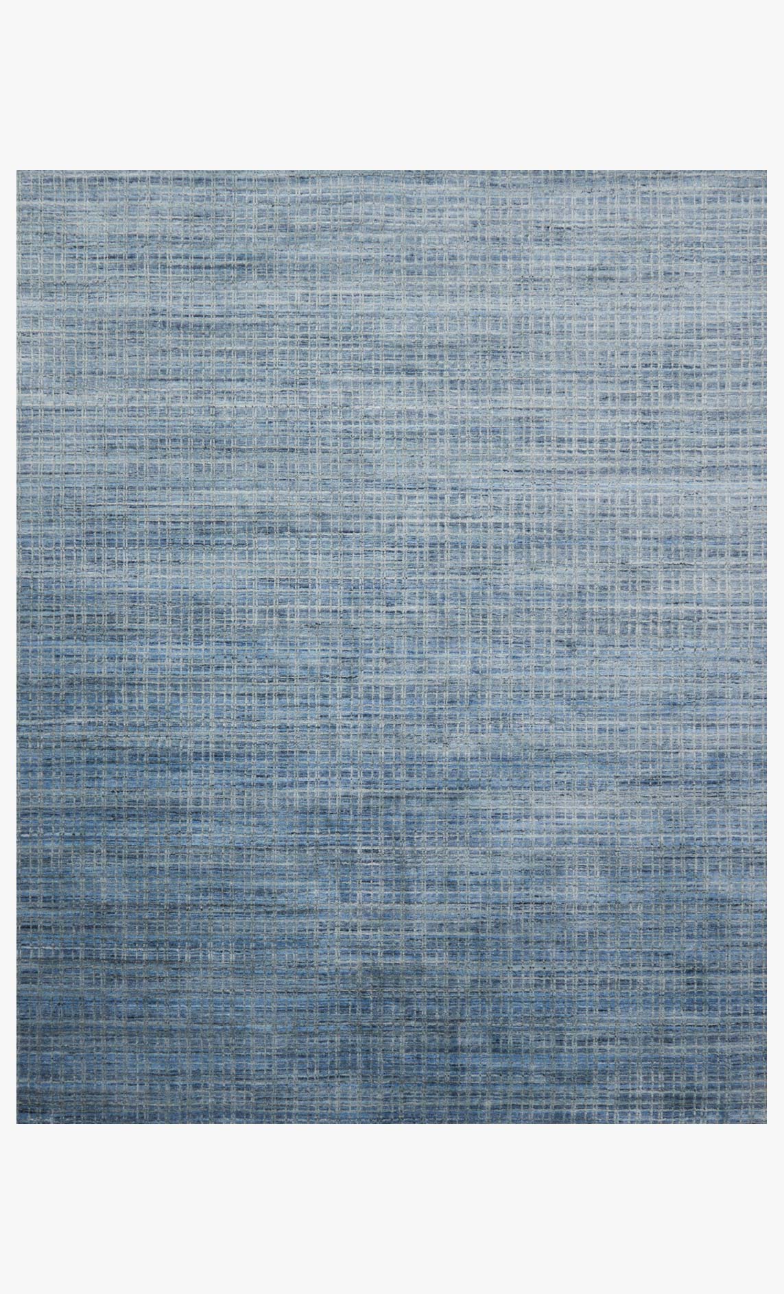 Blue hand-loomed transitional rug with subtle allover grid pattern