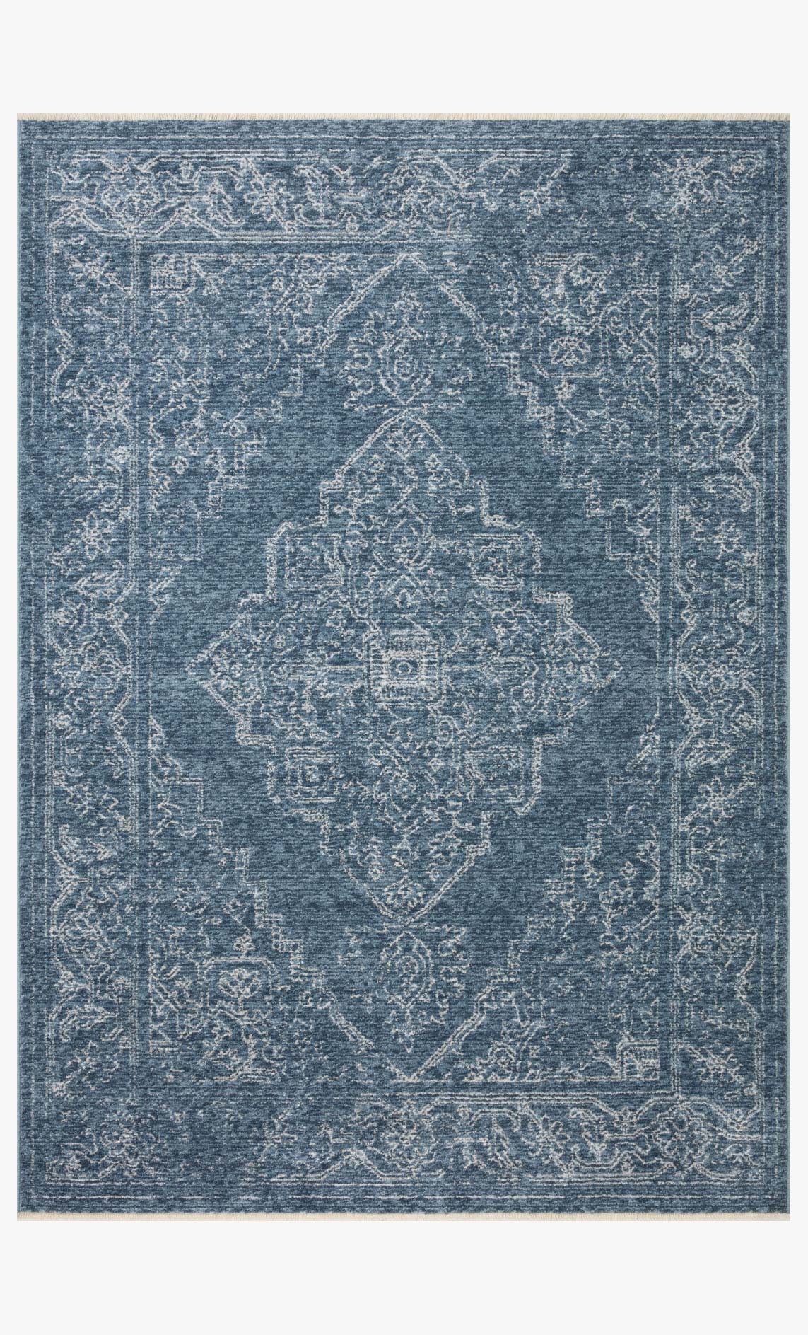 Denim blue traditional power-loomed rug with ornate white medallion pattern