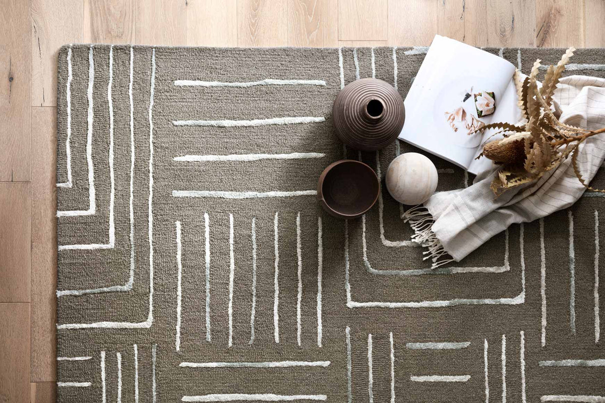 Grey and mist hand-tufted rug with geometric line rectangles and square borders