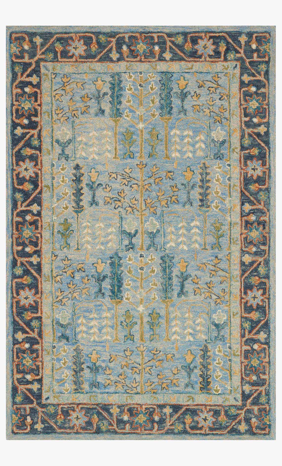 Traditional hooked rug with light and dark blue geometric border, ornate center